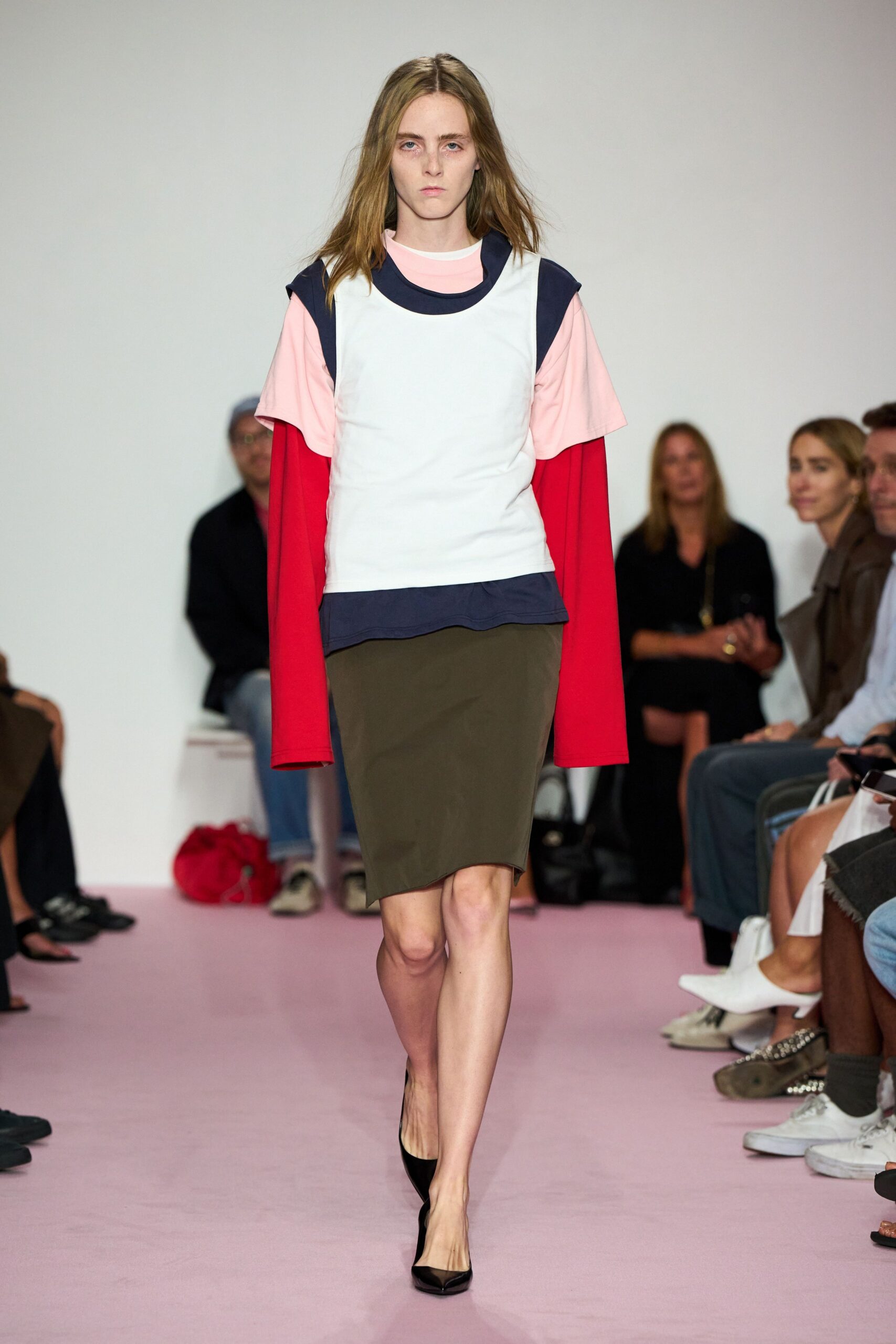 color-blocked fitted top and green skirt