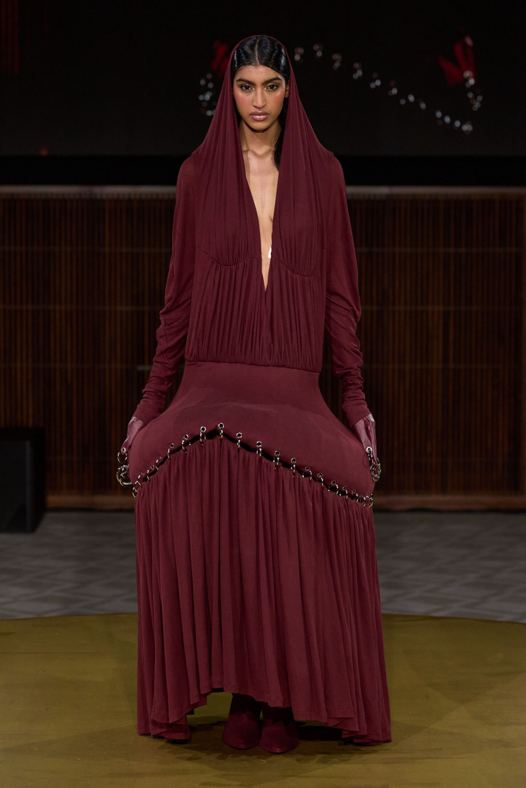 maroon silk long-sleeve v-neck fitted pleated draped gown