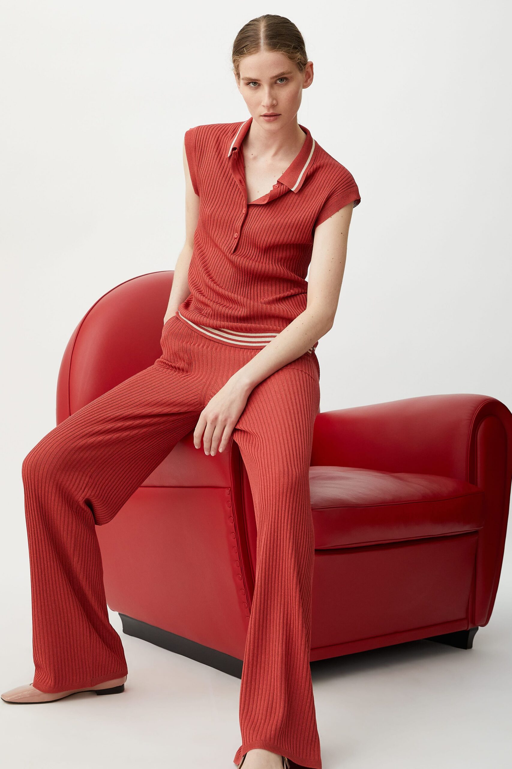 red cotton fitted flared ribbed pants