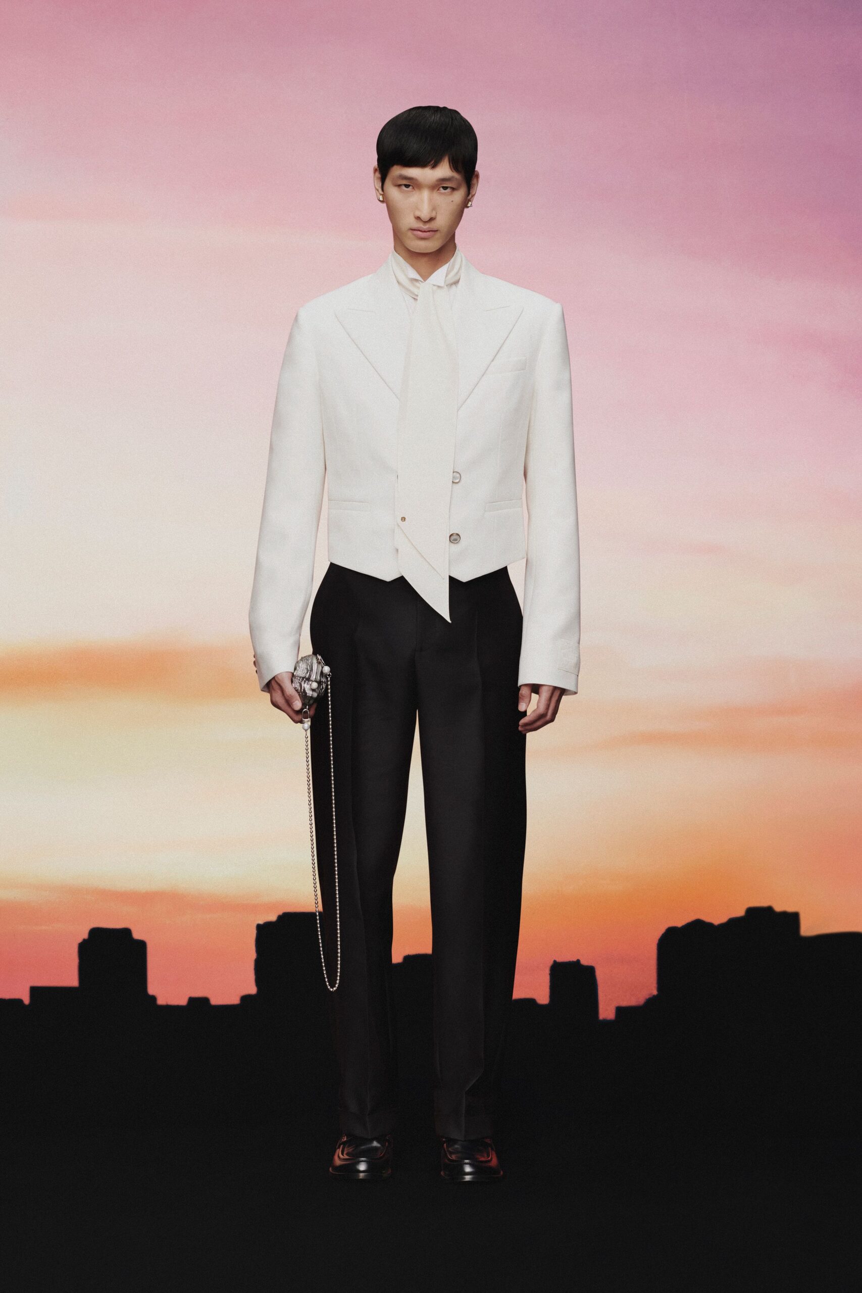white tailored blazer with black pants