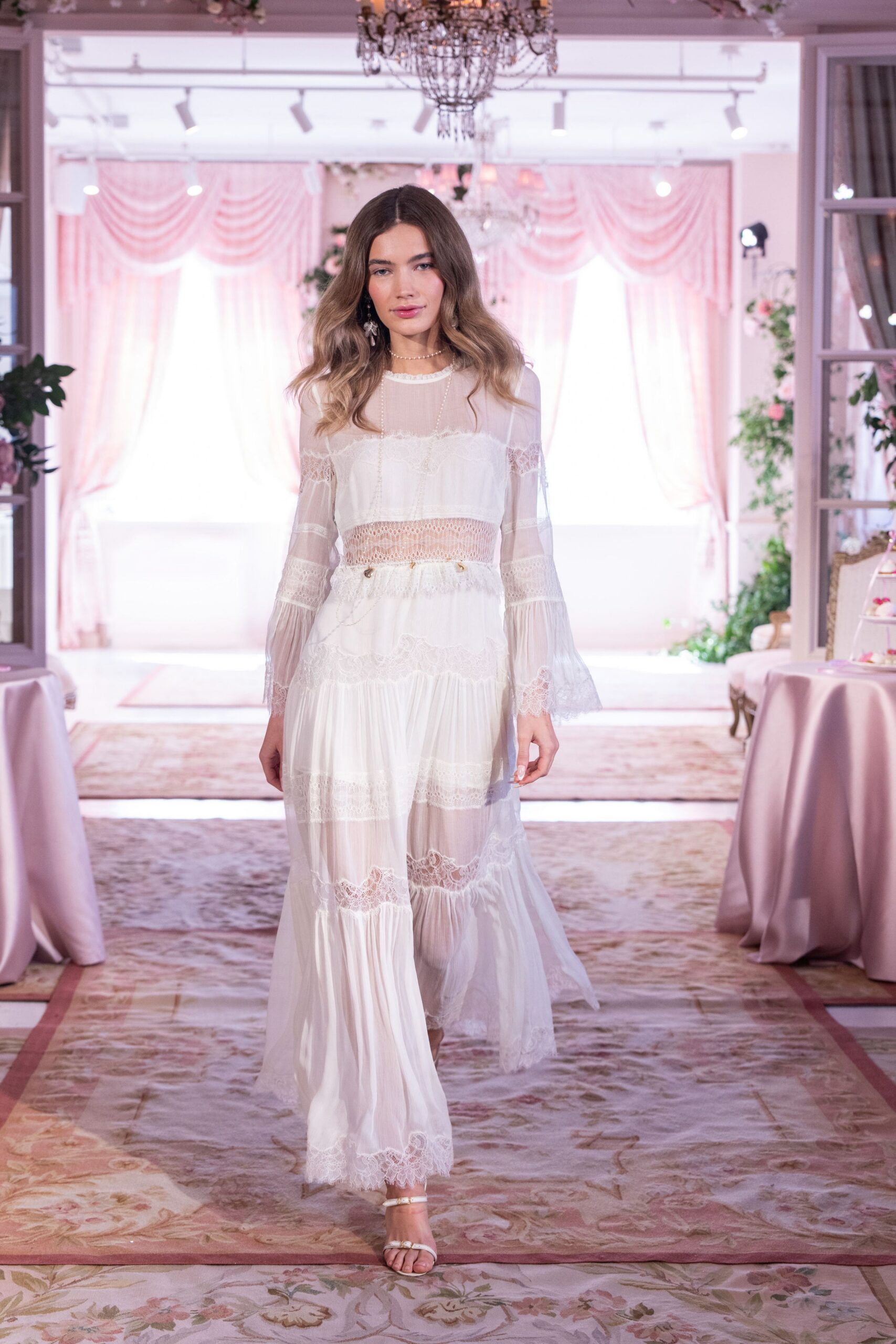 white lace maxi dress with strappy shoes