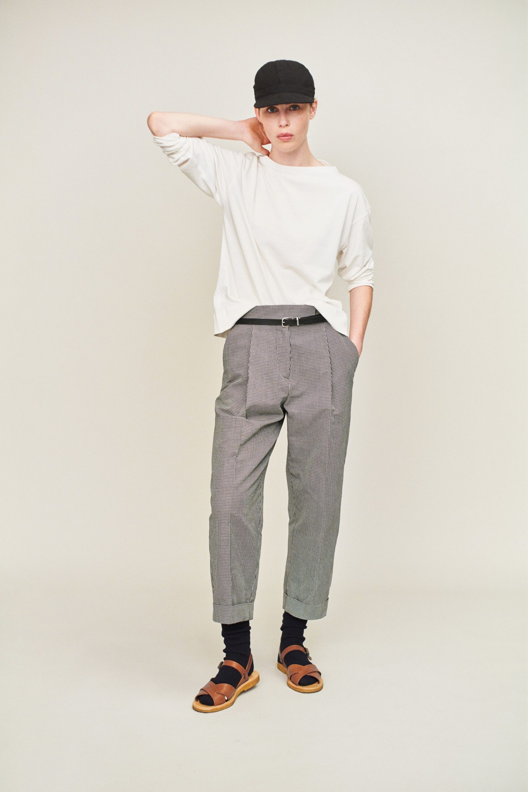 white relaxed top with gray pants