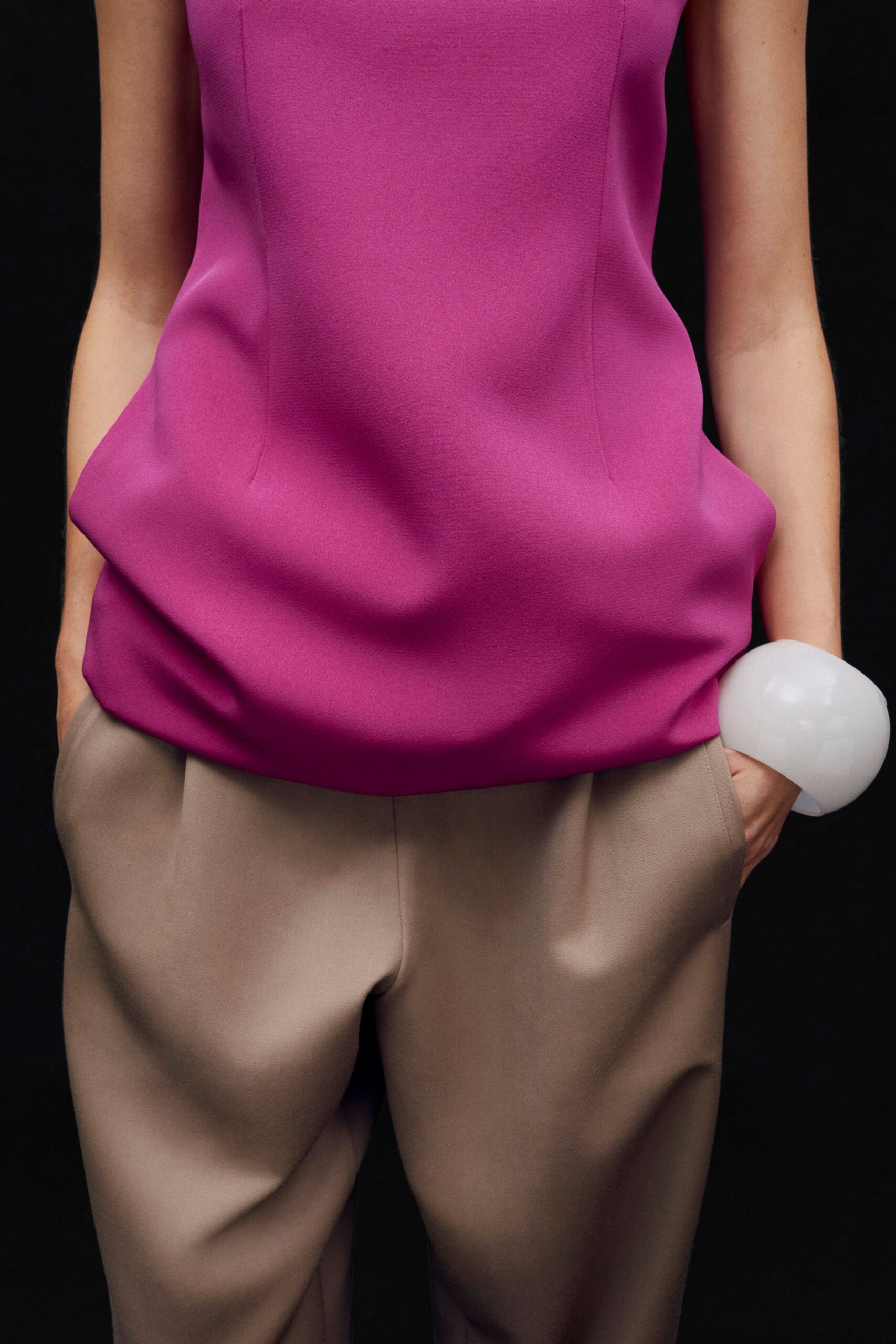 pink neoprene sleeveless high-neck fitted draped top