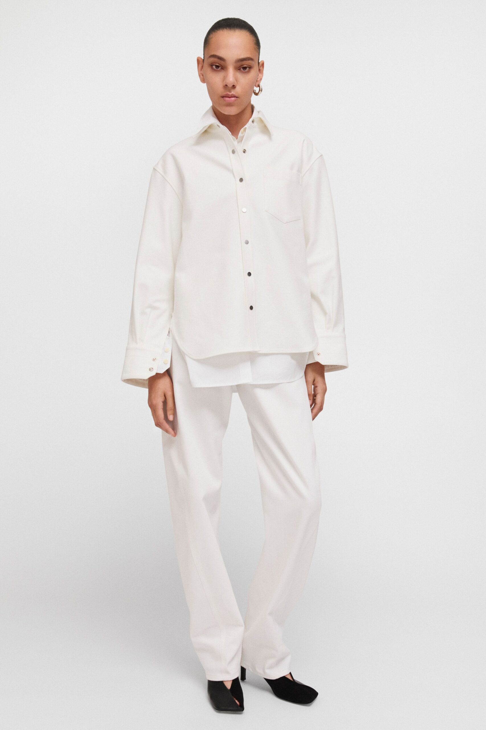 white relaxed shirt and pants