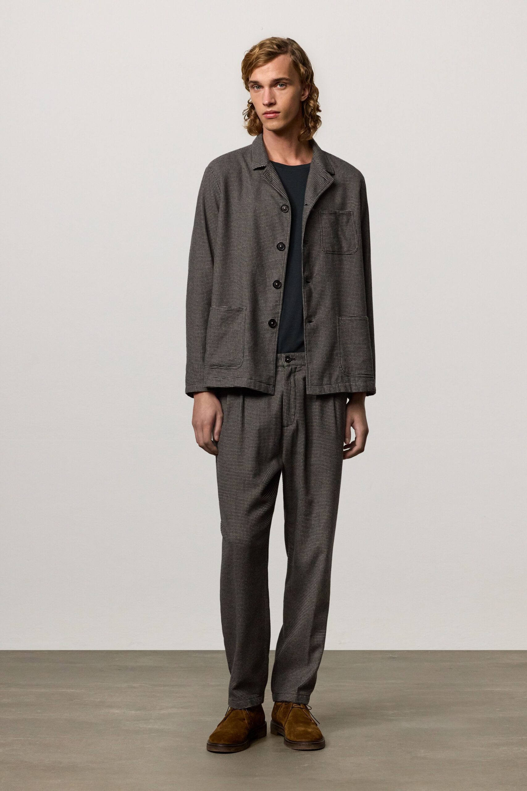 gray relaxed jacket with black shirt