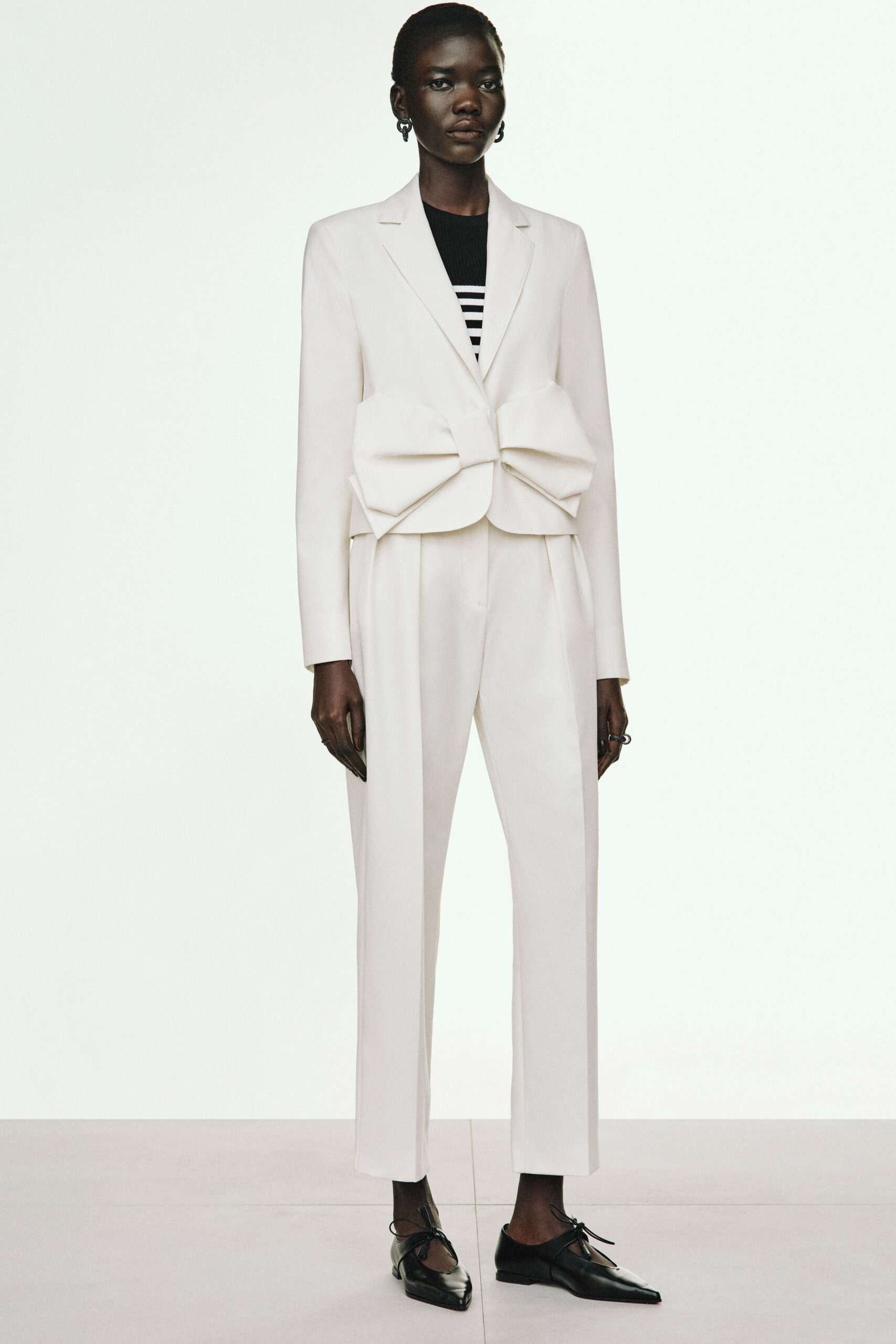 white cotton long-sleeve collared tailored belted suit