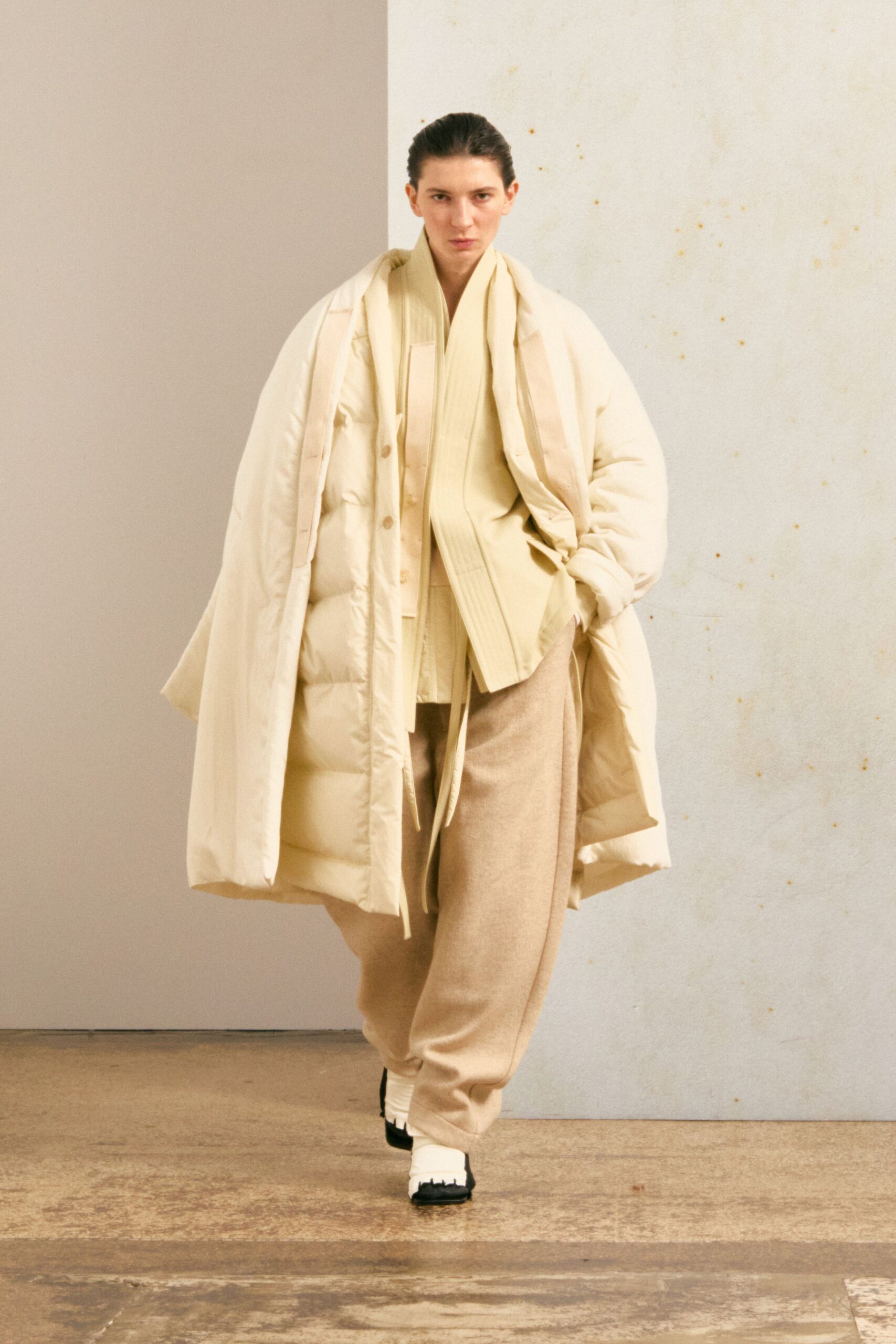 beige long-sleeve collared oversized buttoned coat