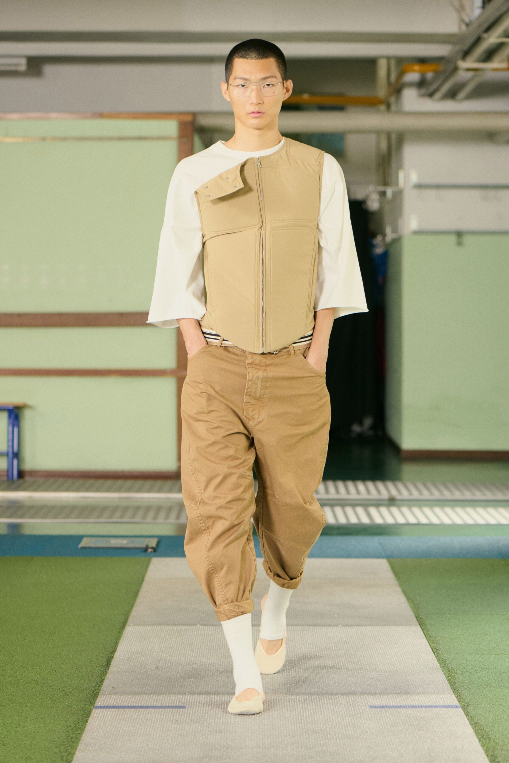 white relaxed top beige vest brown cargo pants