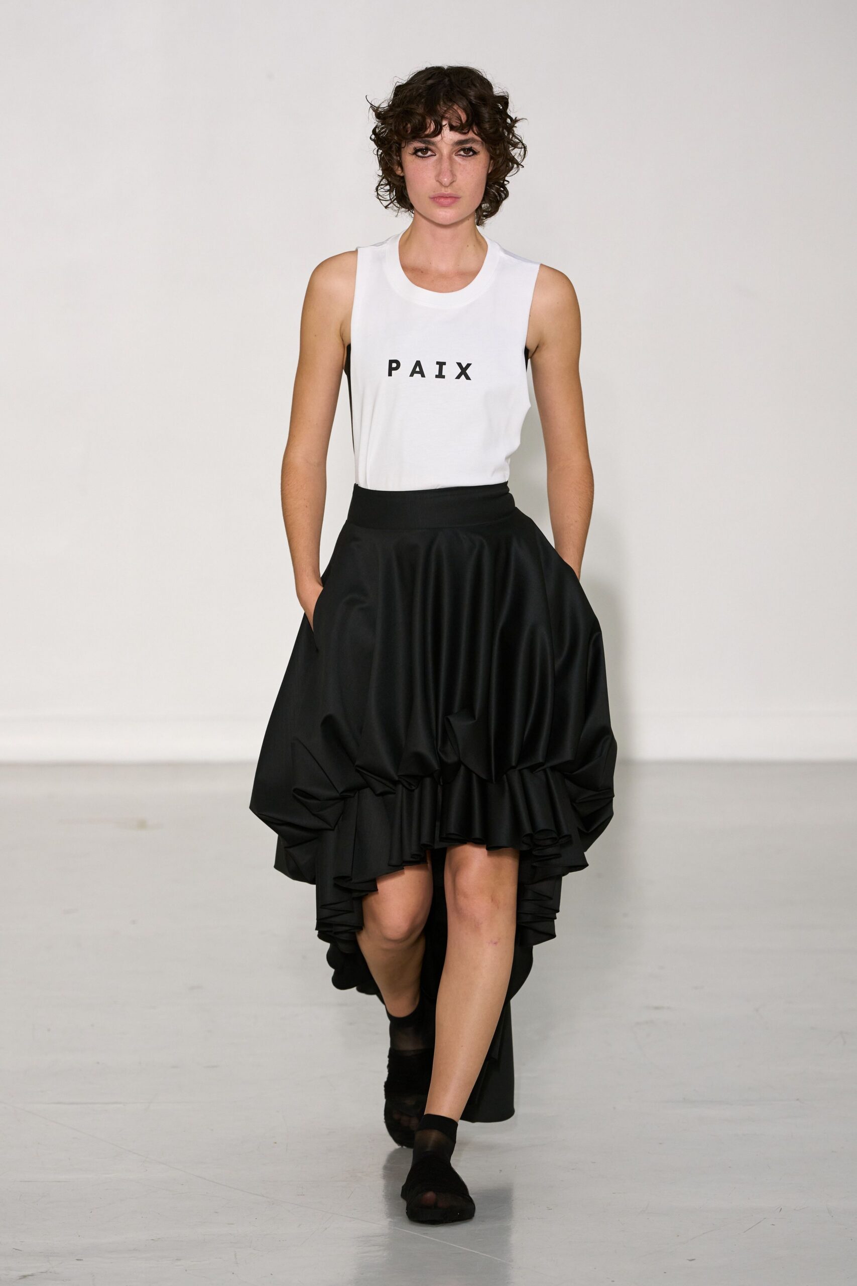 white cotton top black ruffled skirt
