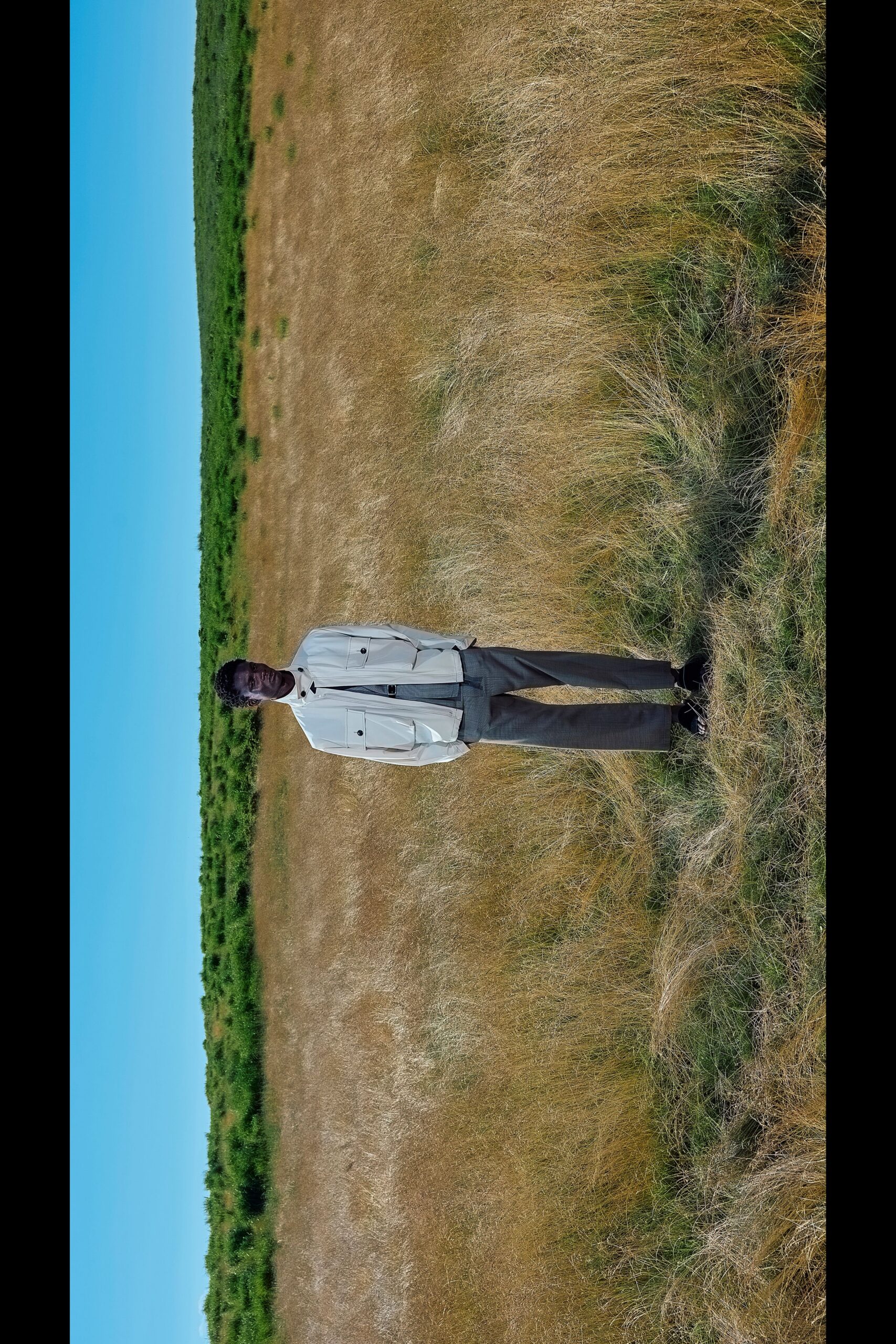 white fitted jacket gray tailored pants
