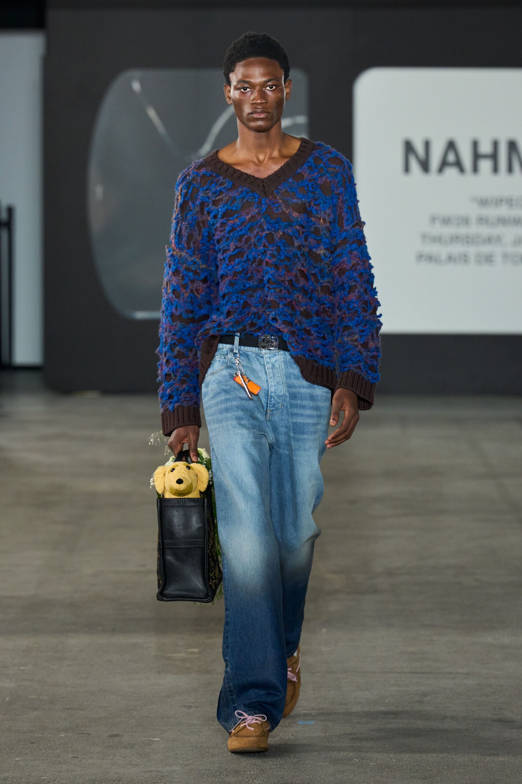 blue crochet sweater with denim pants