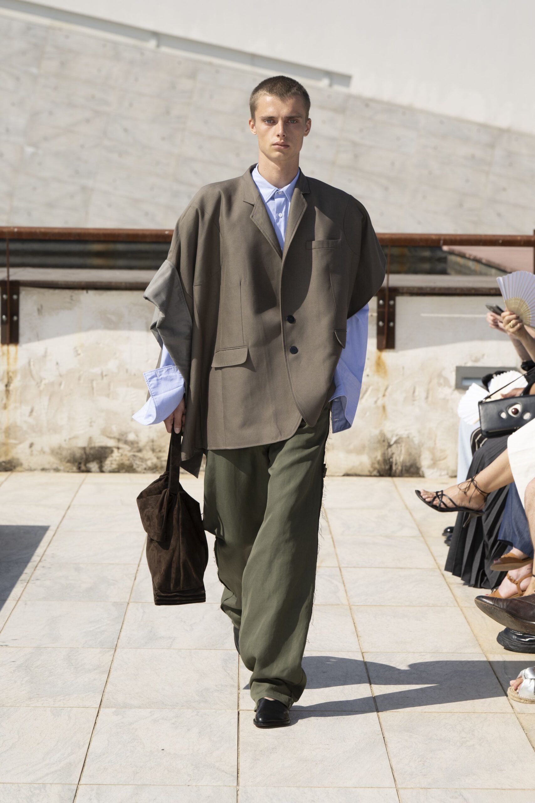 brown blazer blue shirt green pants