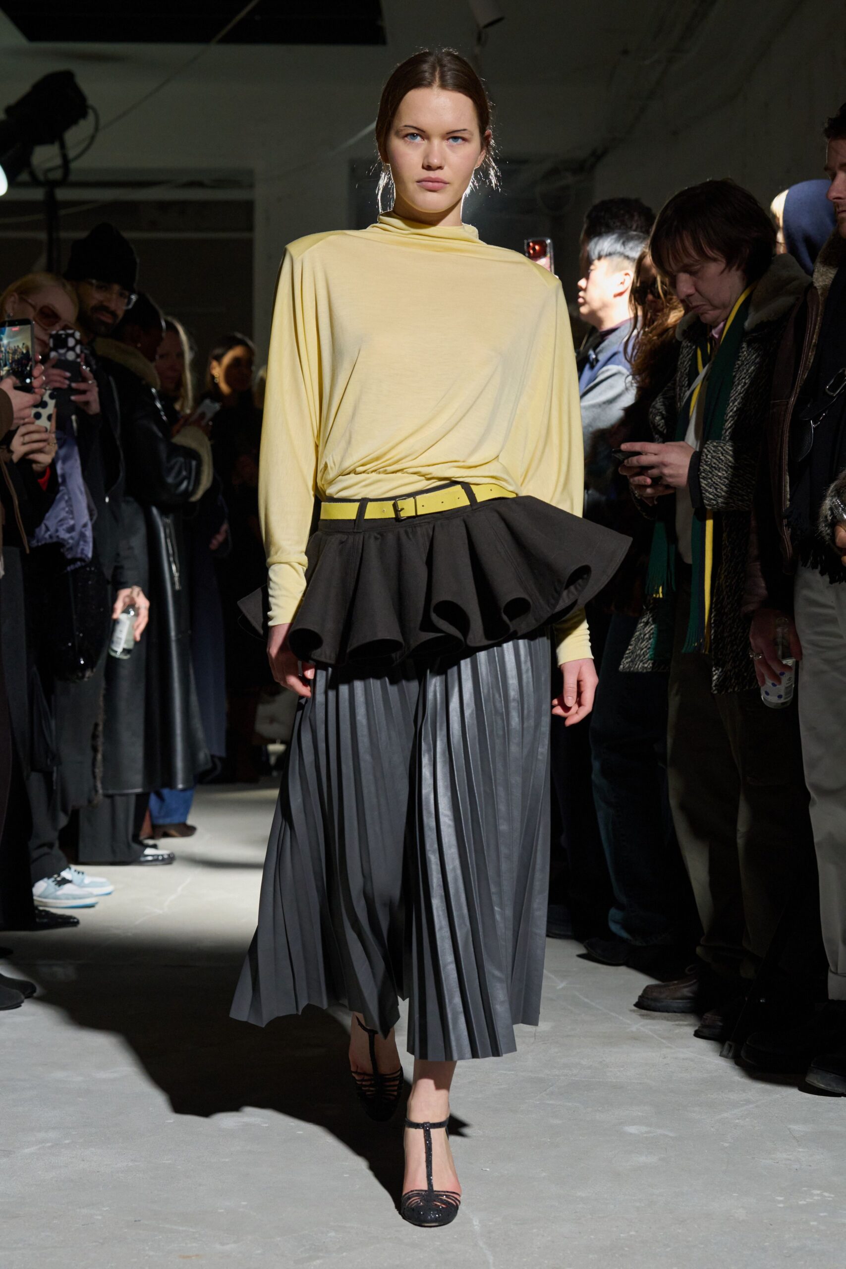 yellow relaxed top with black skirt