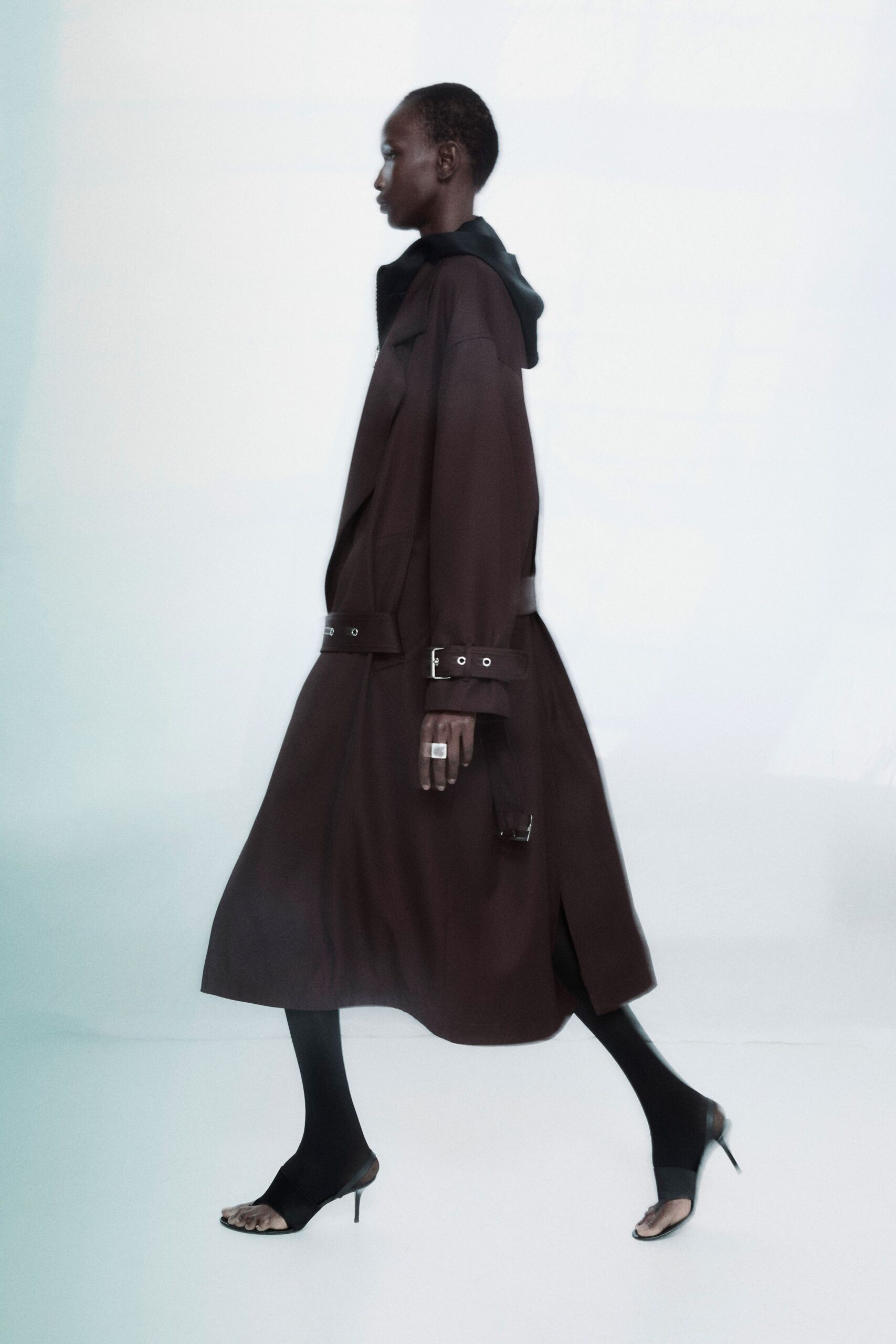 black relaxed coat and shoes