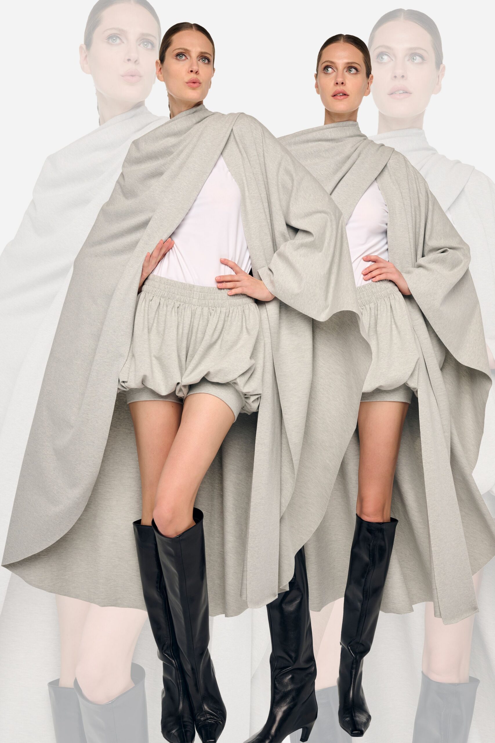 gray cape with fitted shorts