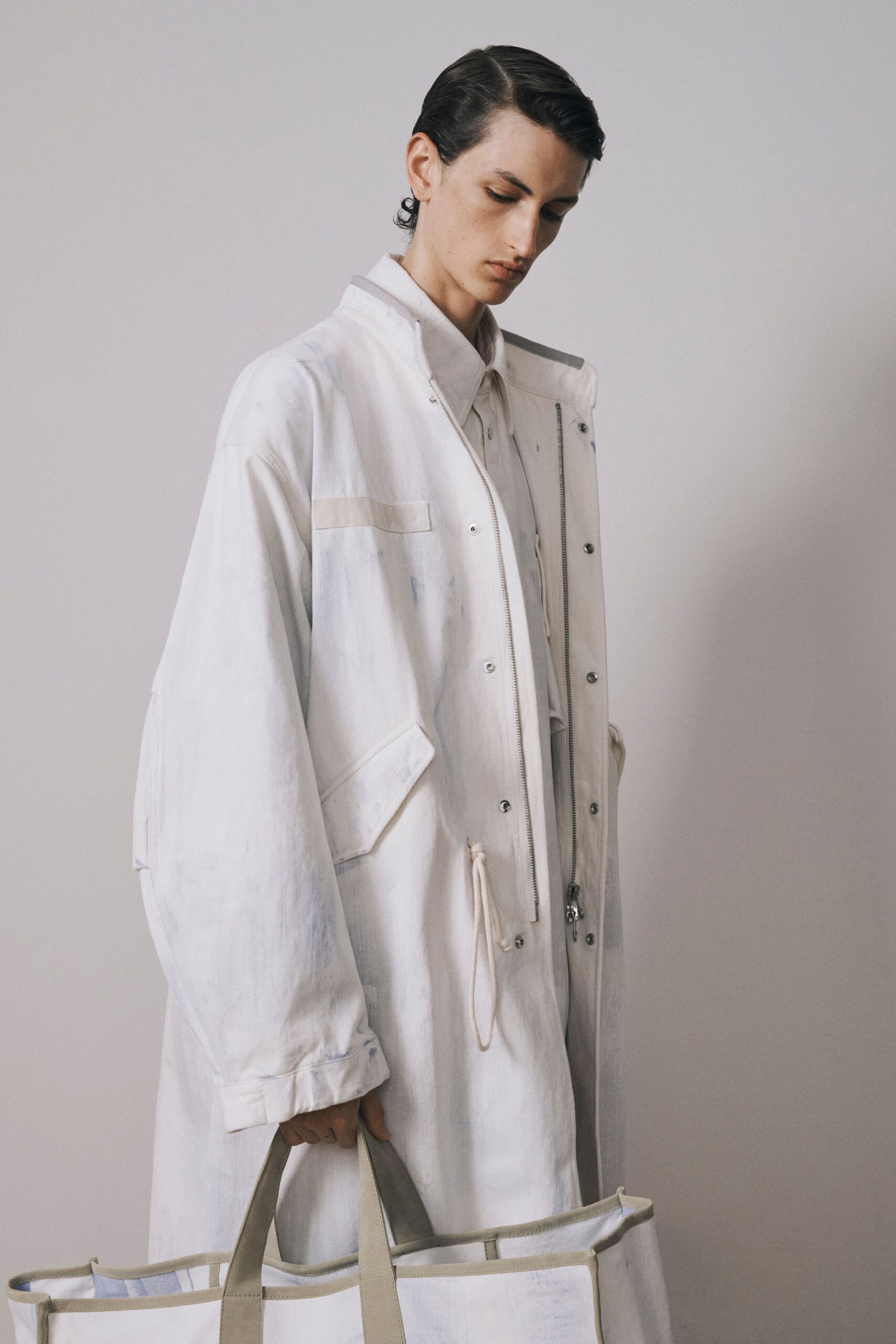 white cotton long-sleeve collared oversized buttoned coat