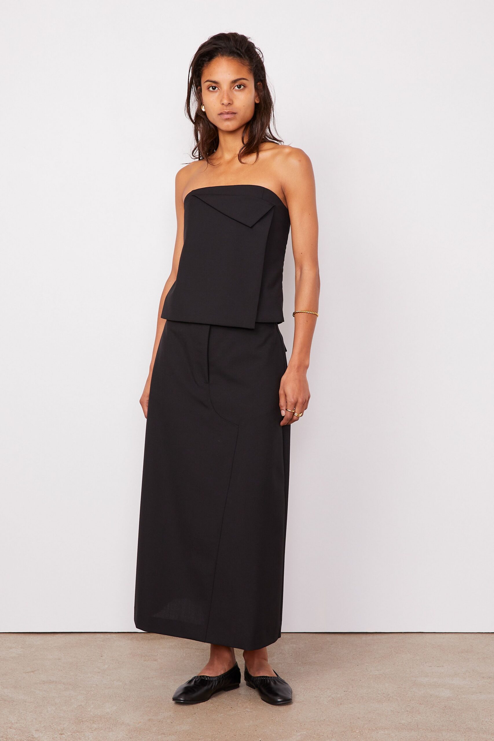 black cotton relaxed straight-leg midi skirt