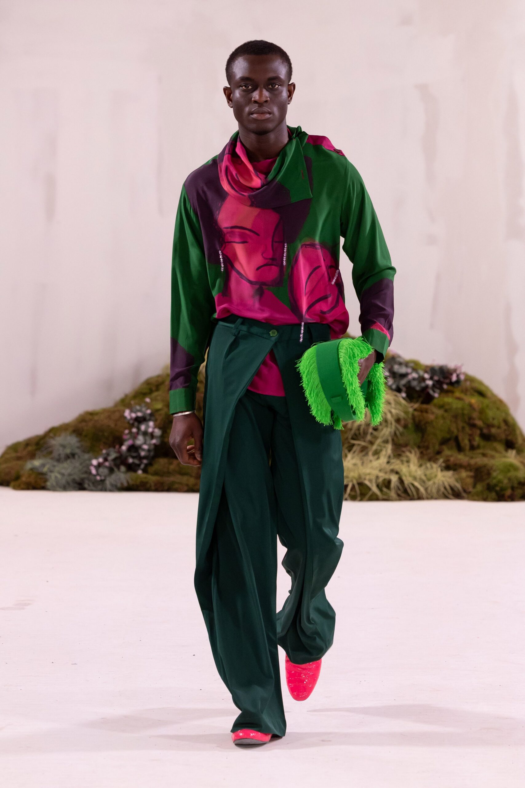 green printed shirt and pants