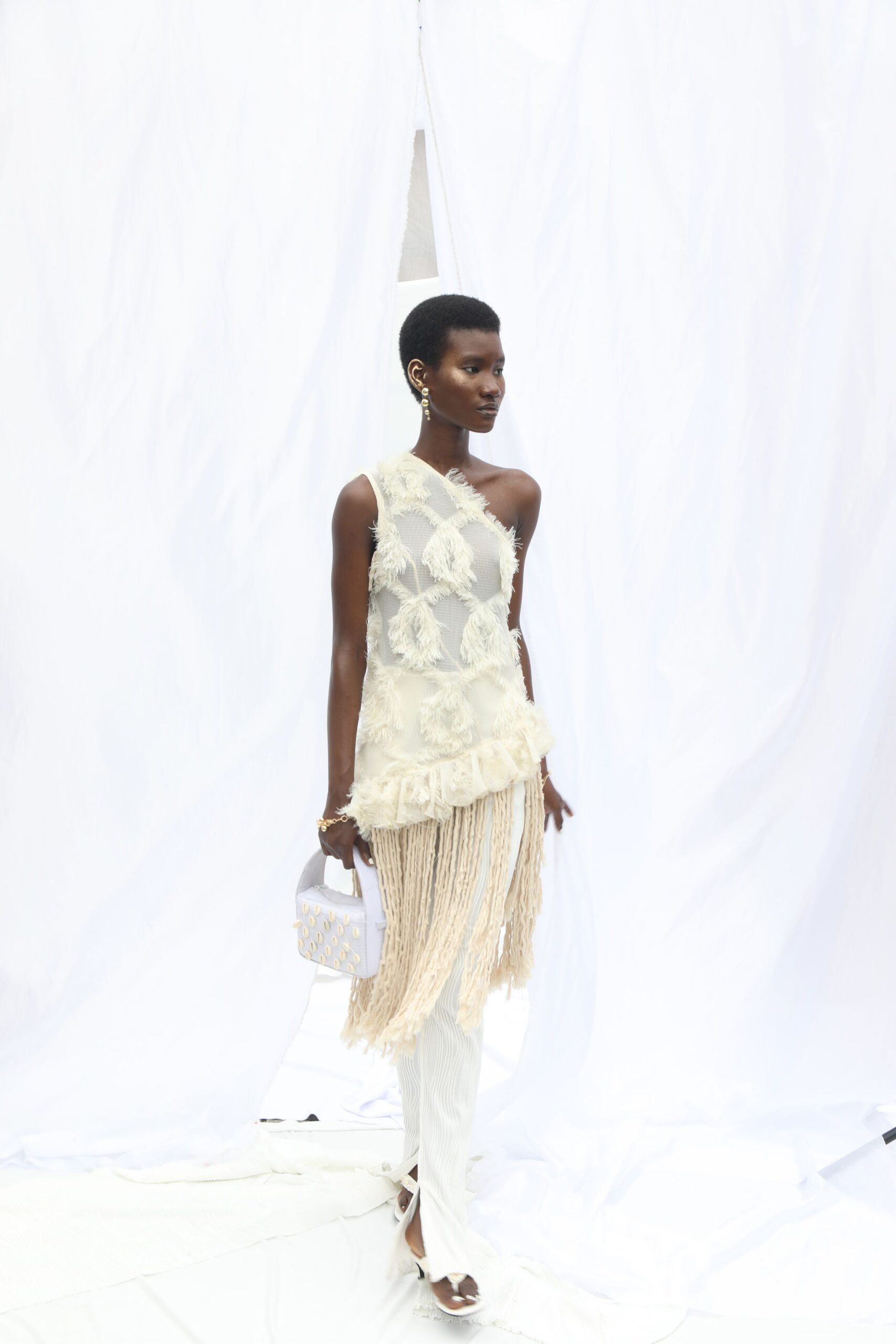 beige silk sleeveless high-neck fitted fringed embroidered top