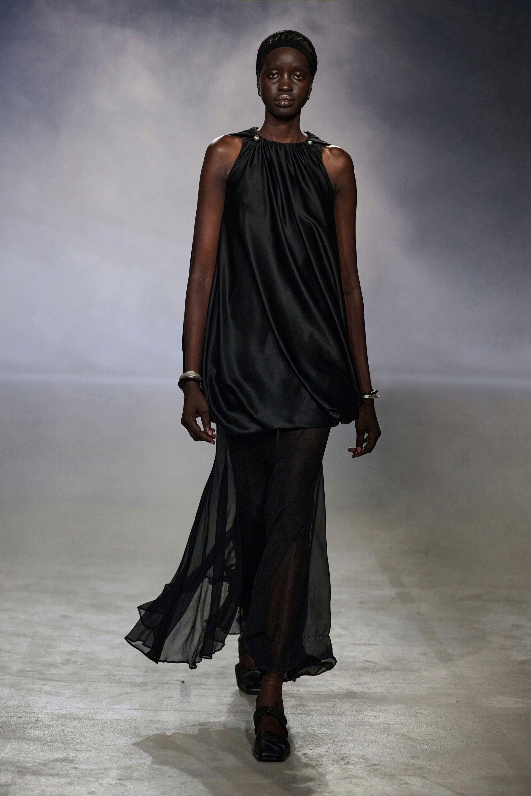 black flowing maxi dress with shoes