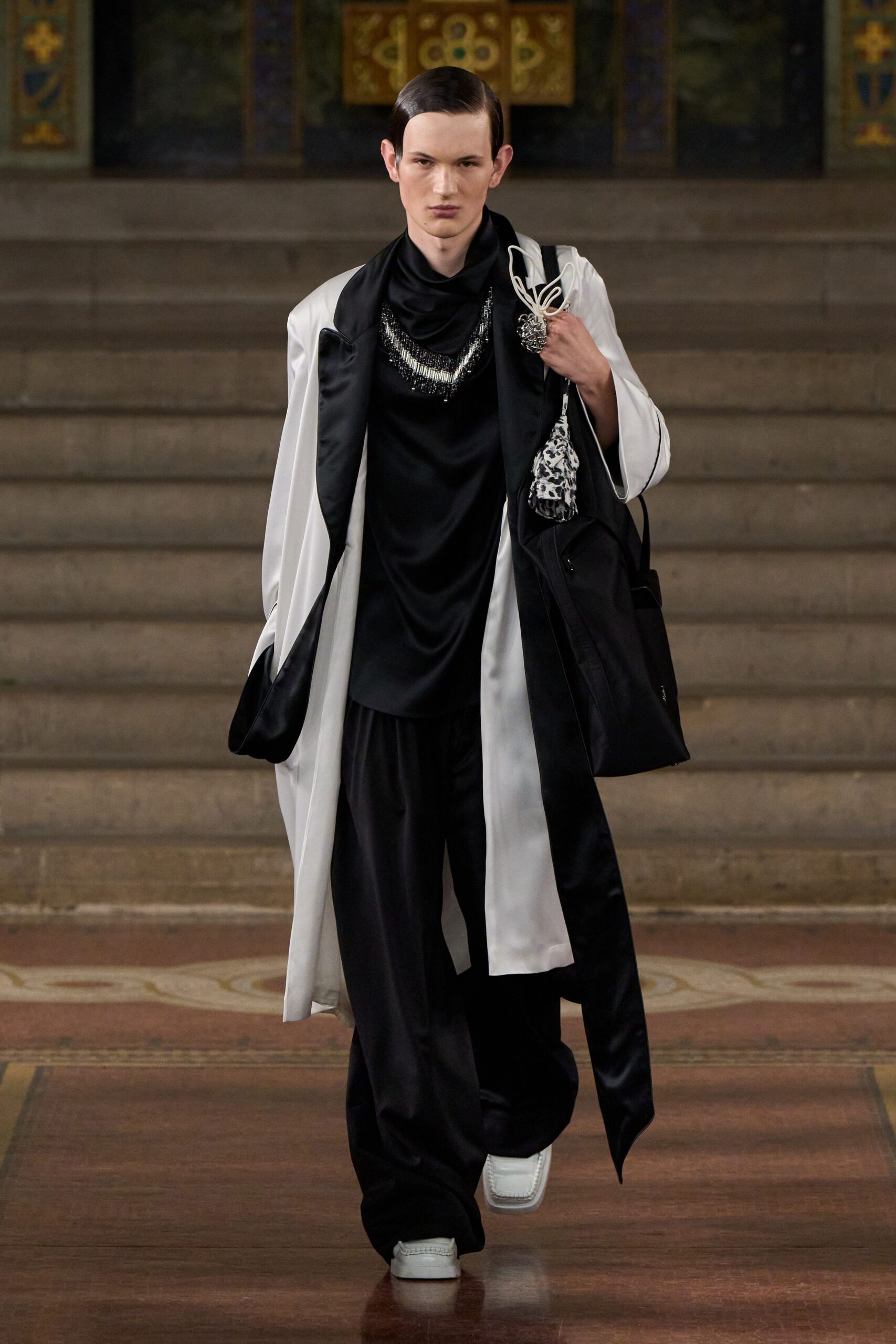 white silk coat black top