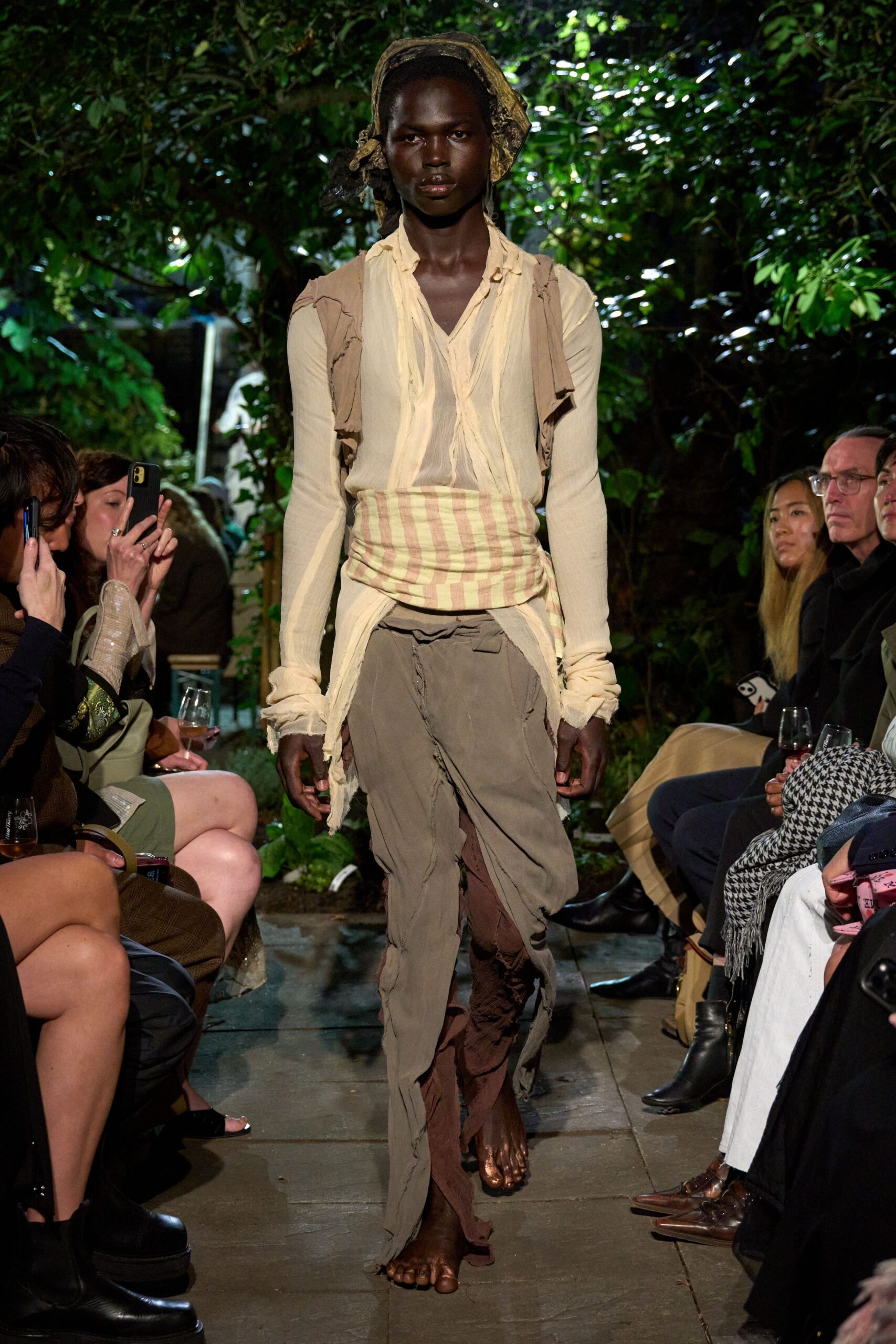 beige relaxed top with gray pants