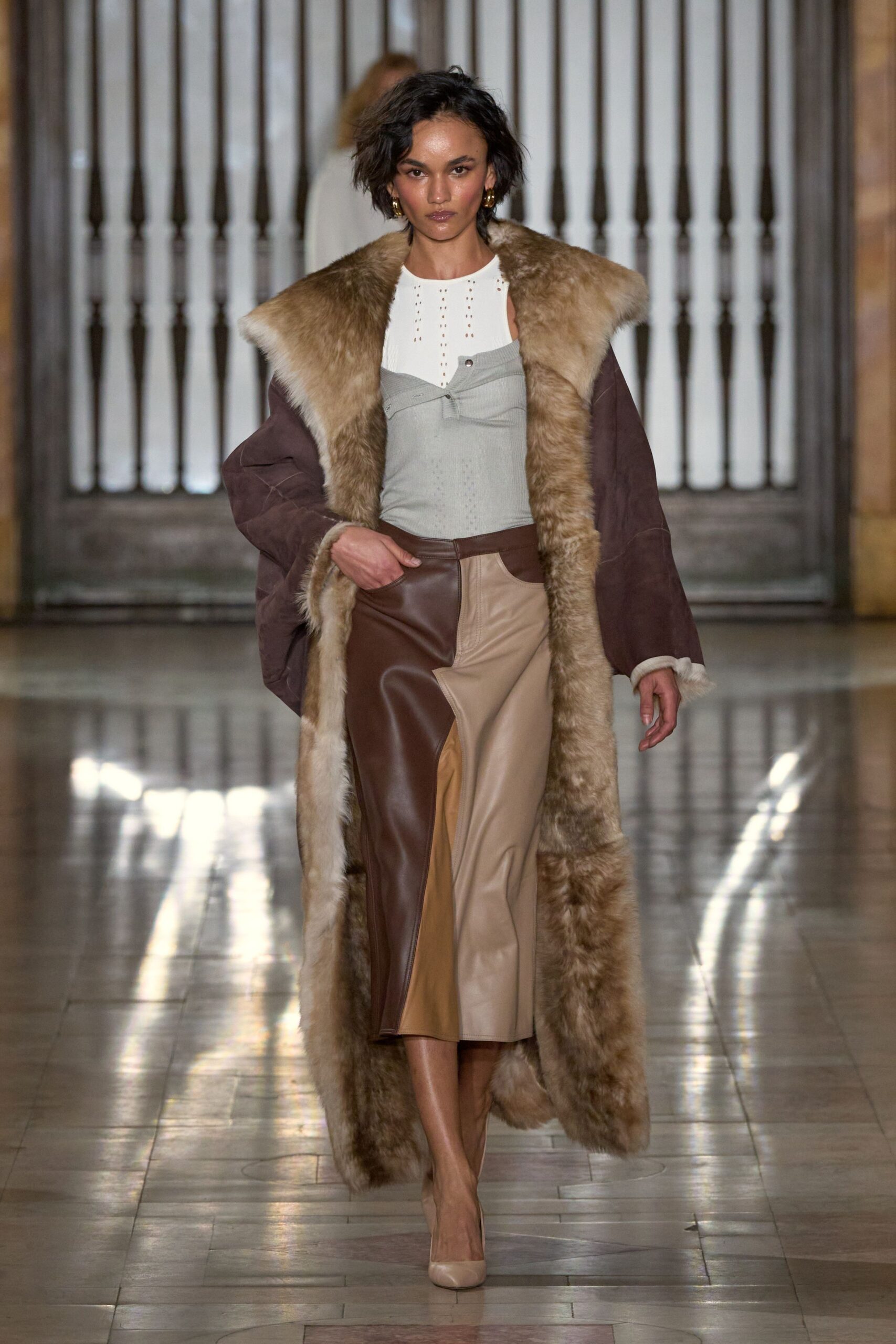 brown fur coat with gray top
