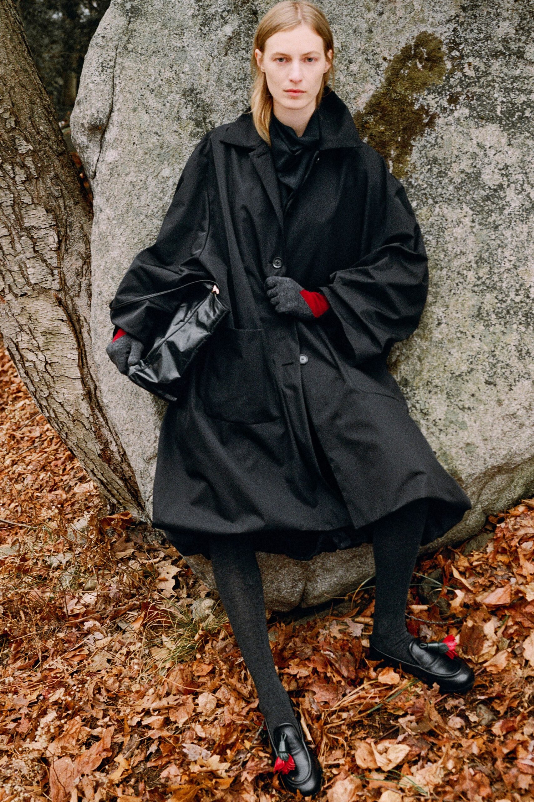 black cotton long-sleeve collared oversized pockets midi coat