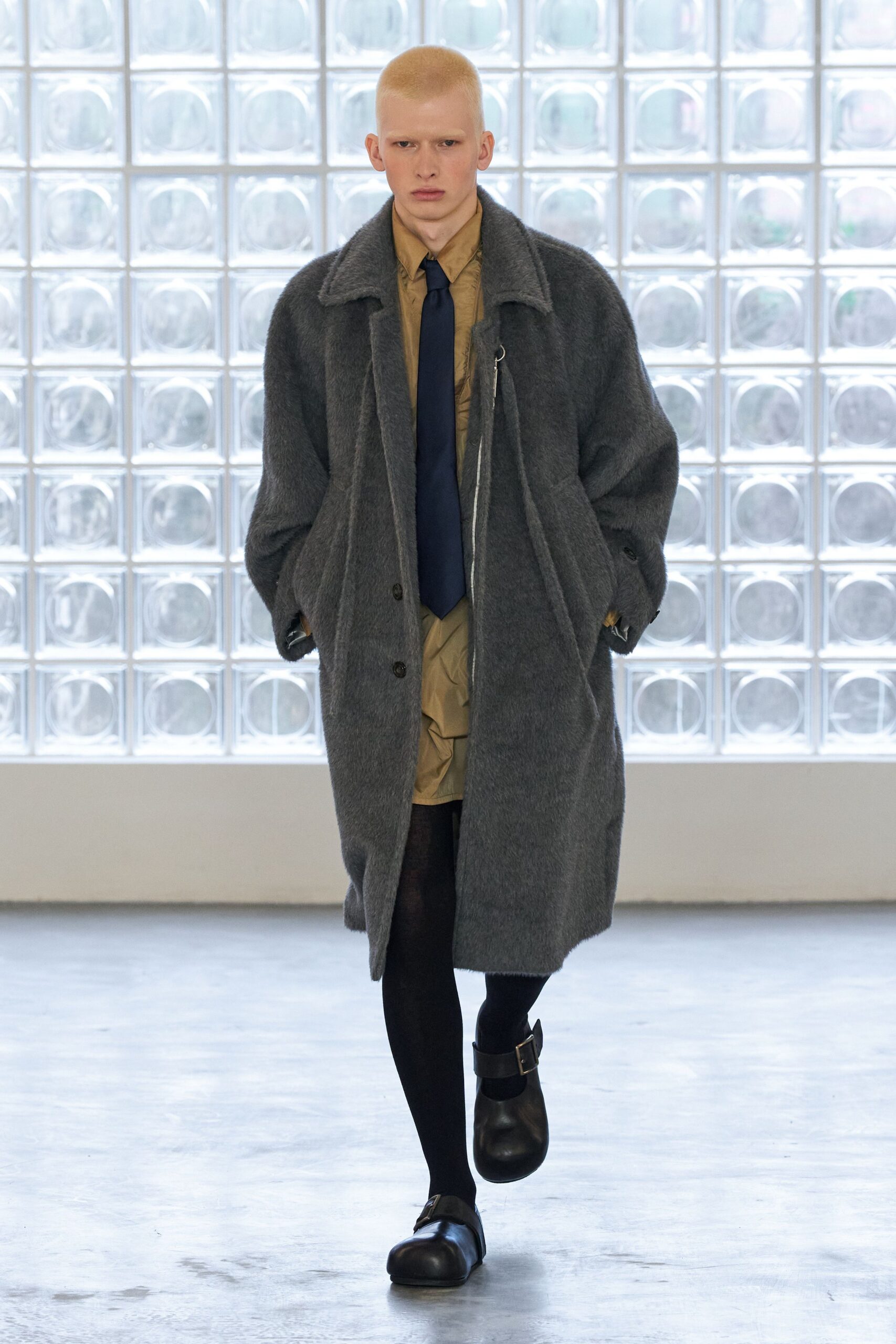 gray wool coat with beige shirt