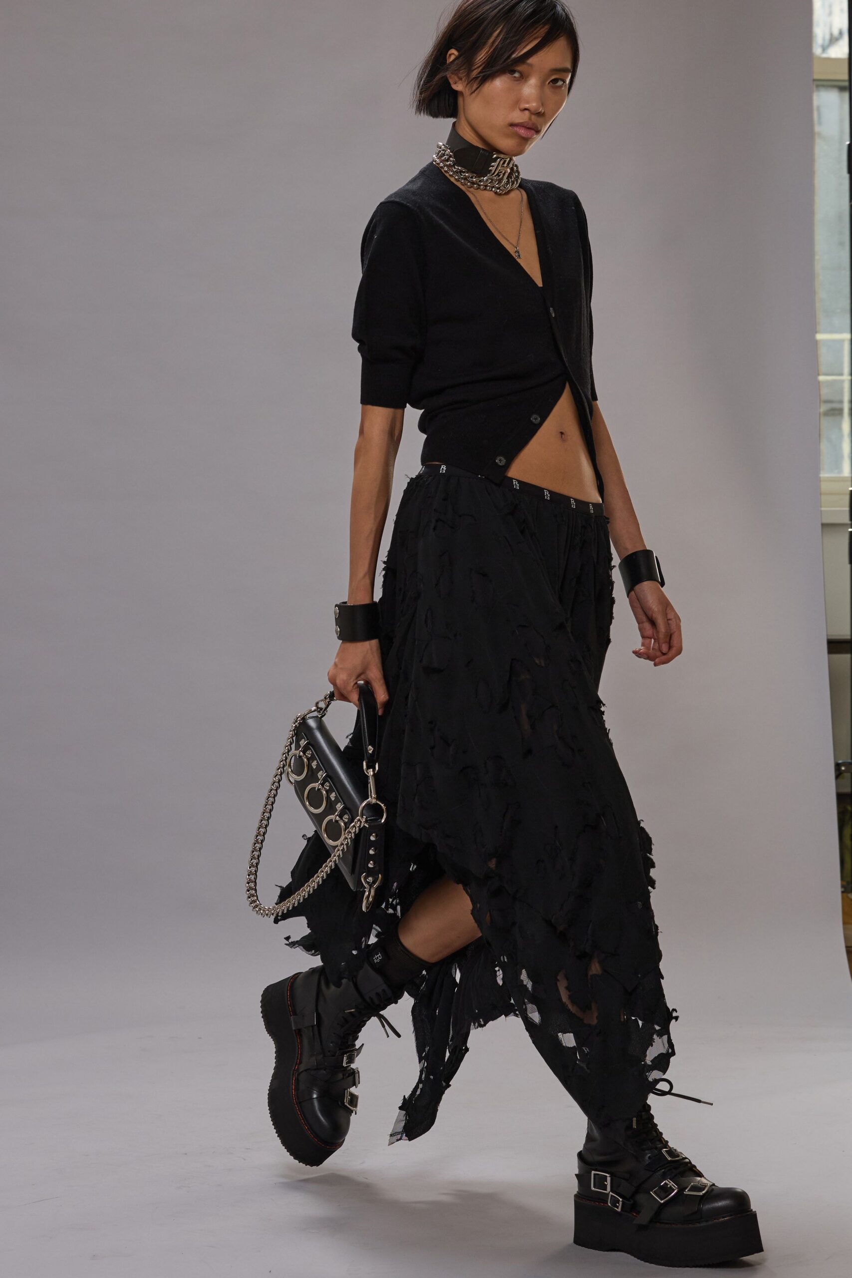 black fitted top and relaxed midi skirt