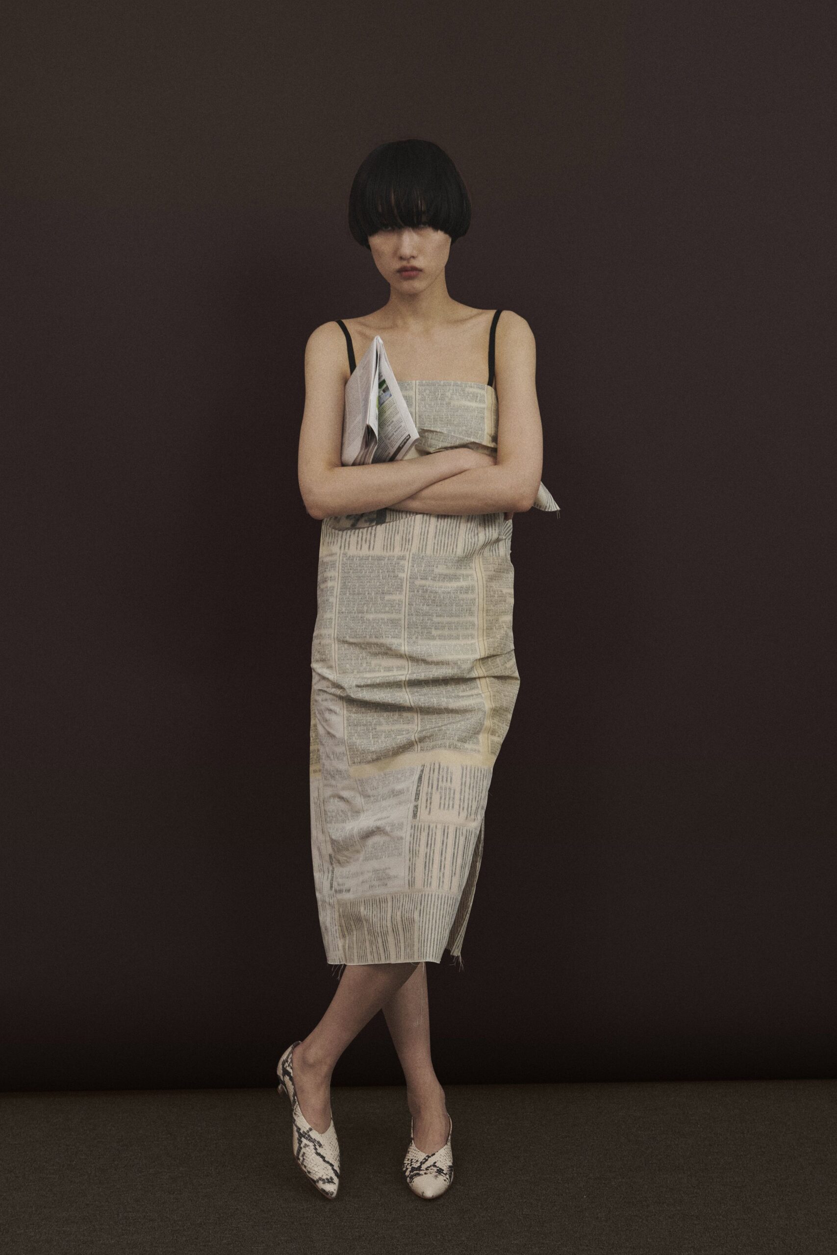 beige printed midi dress with snakeskin shoes