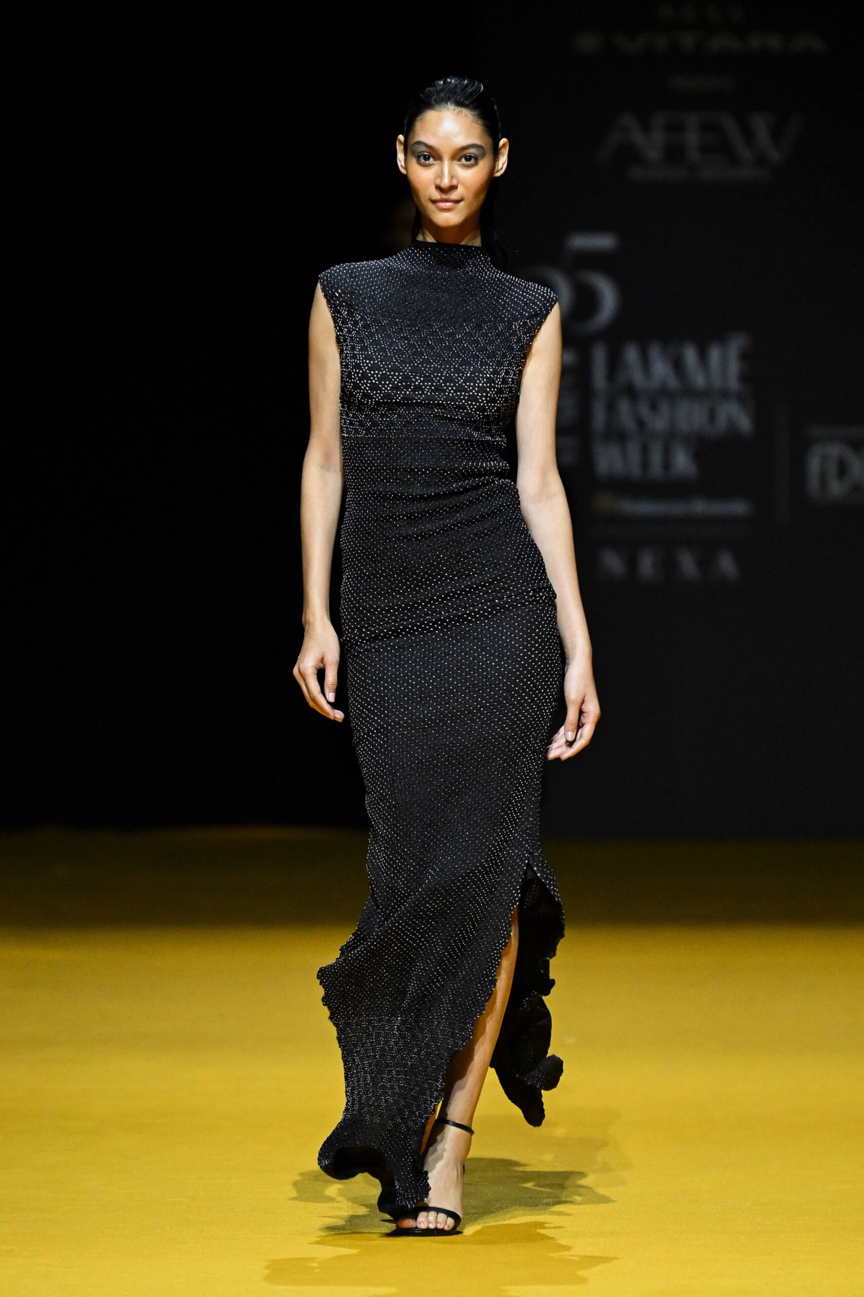 black fitted sleeveless dress