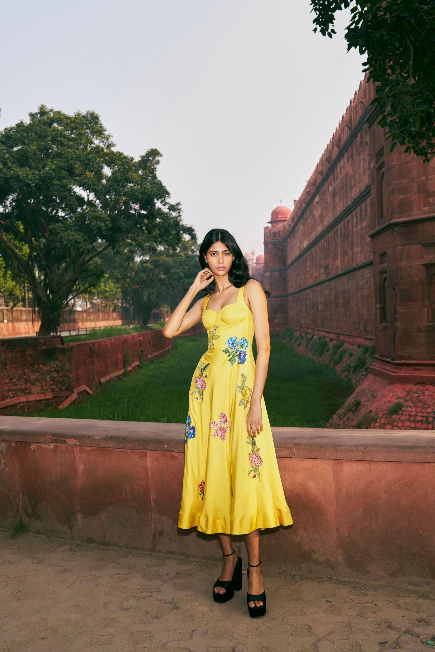 yellow silk sleeveless v-neck fitted embroidered flared dress