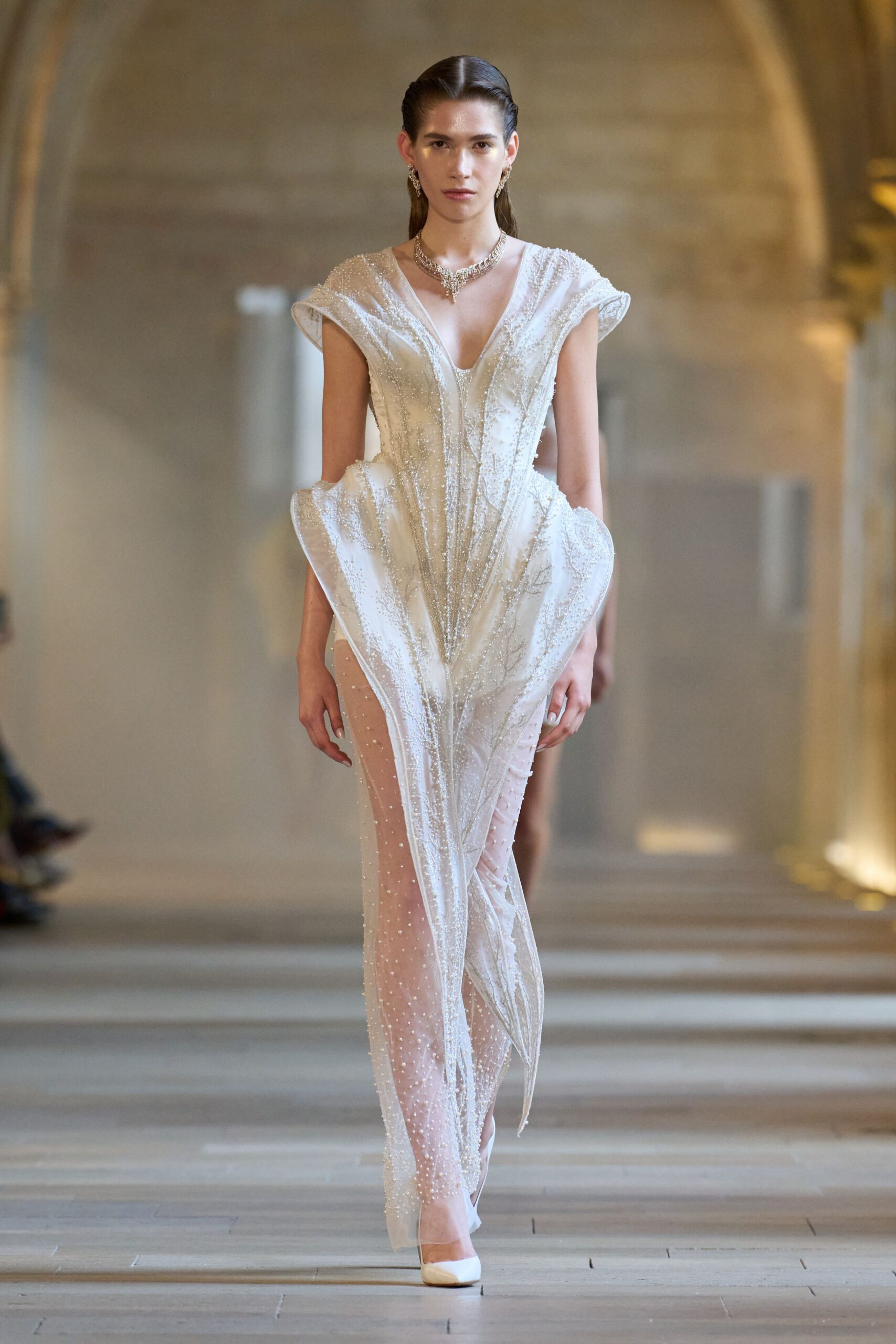 white embellished gown with heels