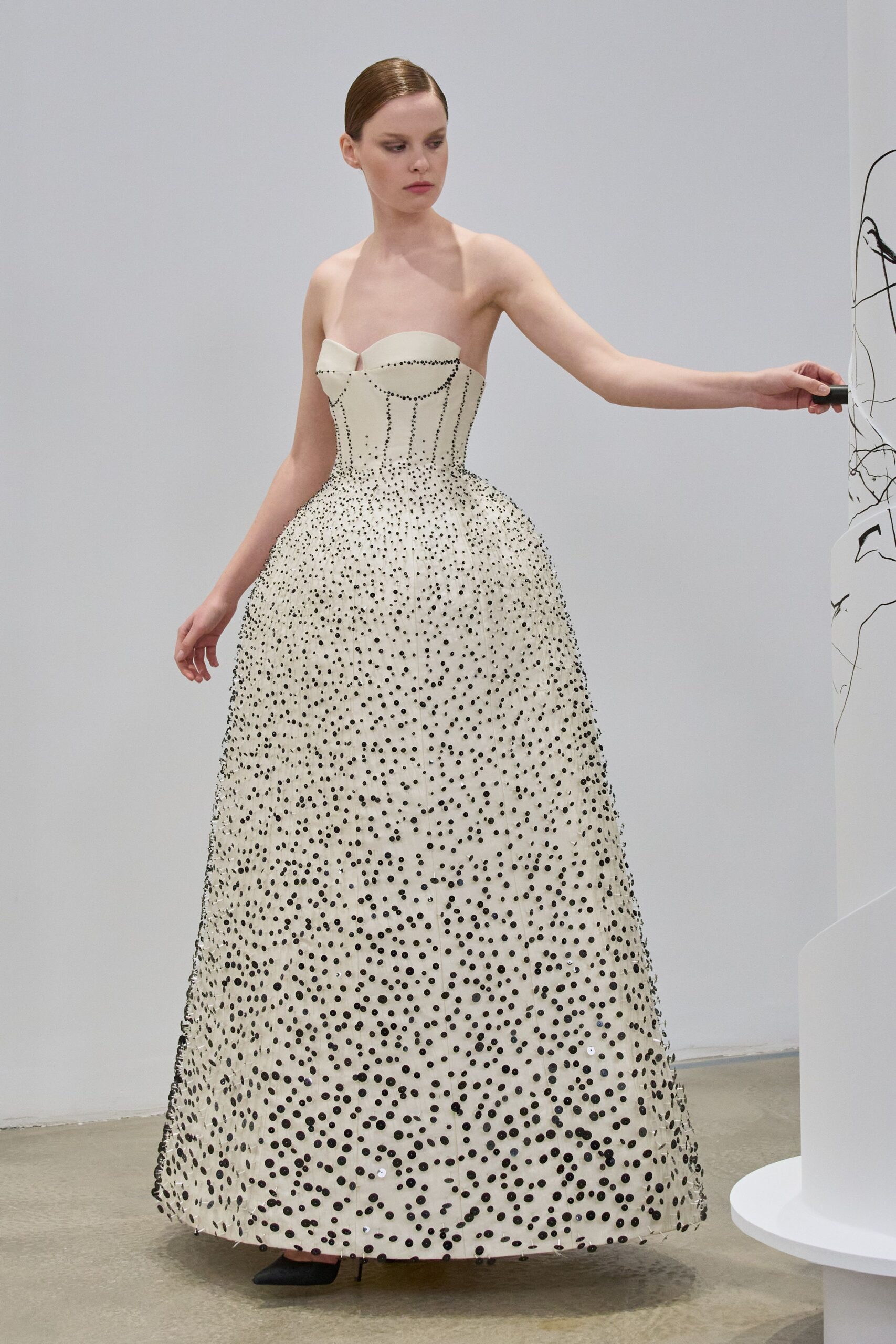white silk strapless fitted pleated embellished maxi gown