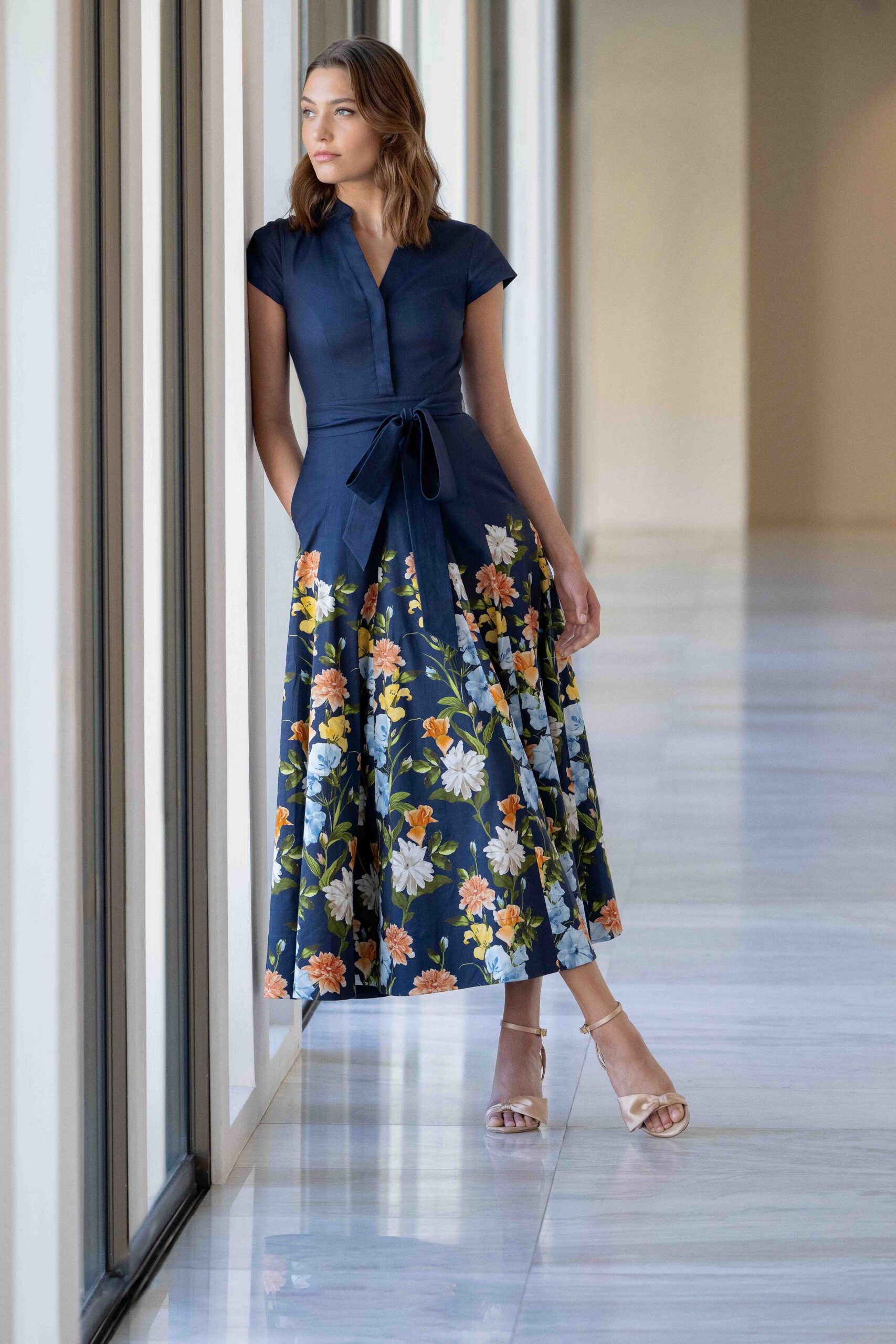 blue floral midi dress with strappy shoes
