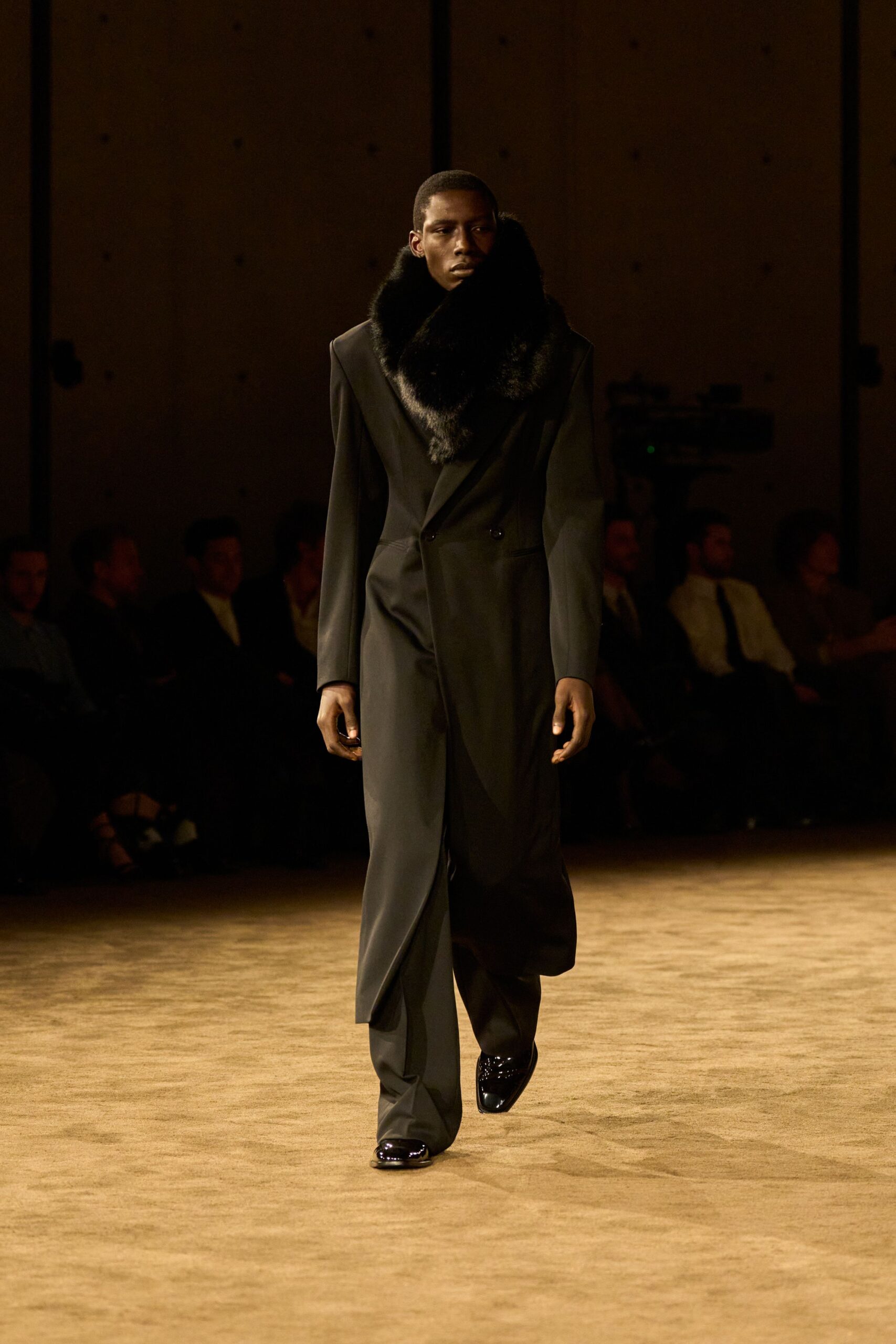 black tailored suit with faux-fur scarf