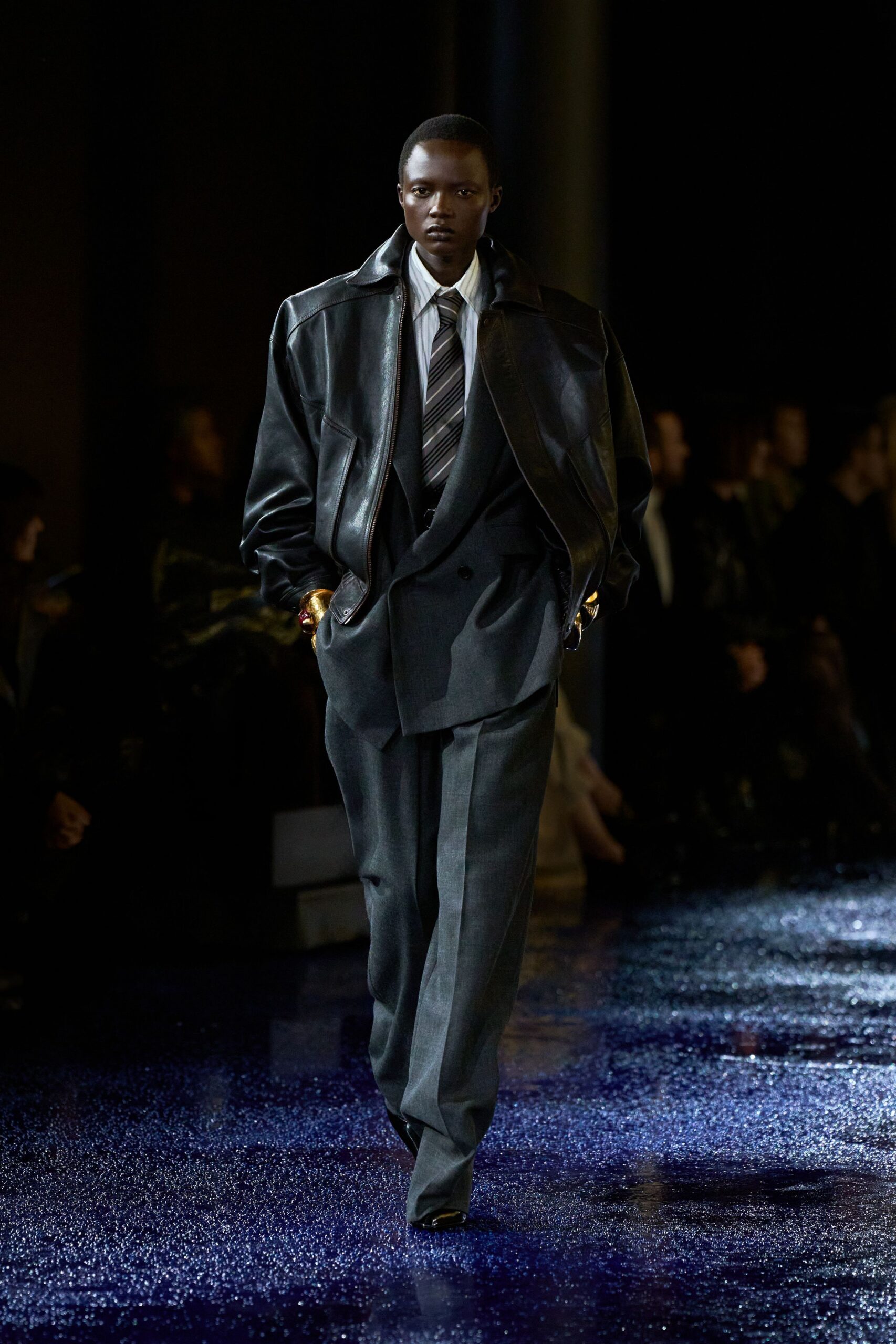 black leather oversized jacket with gray suit