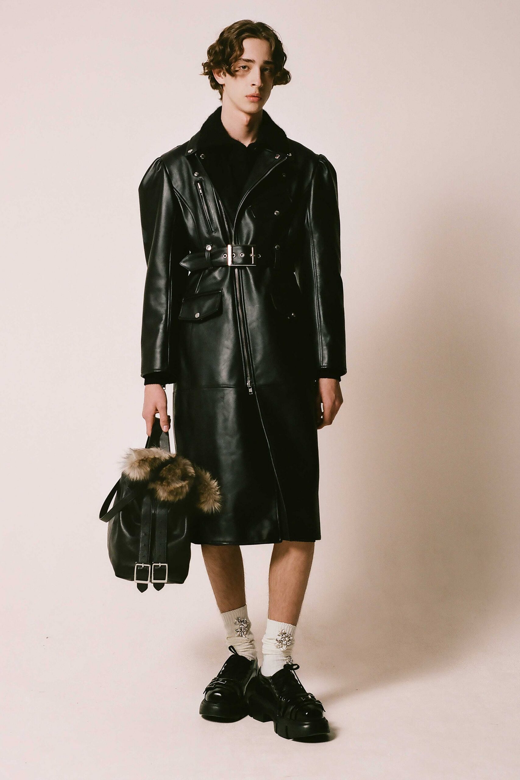 black leather long-sleeve collared fitted zippered belted coat