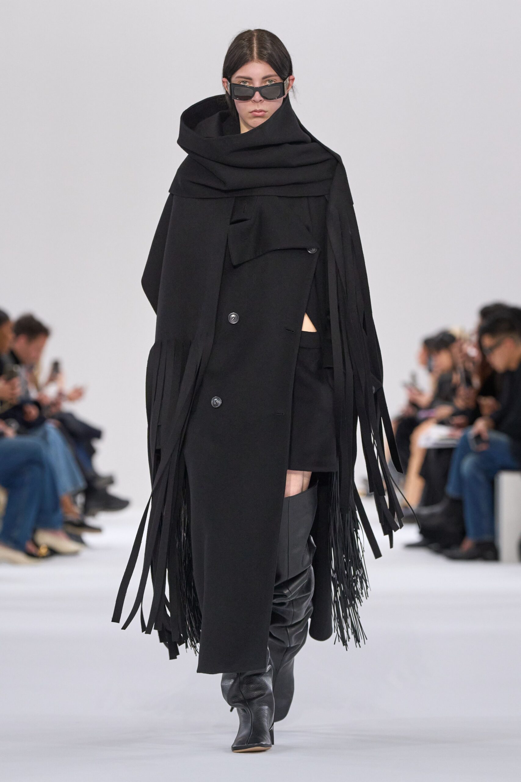 black wool coat with fringes