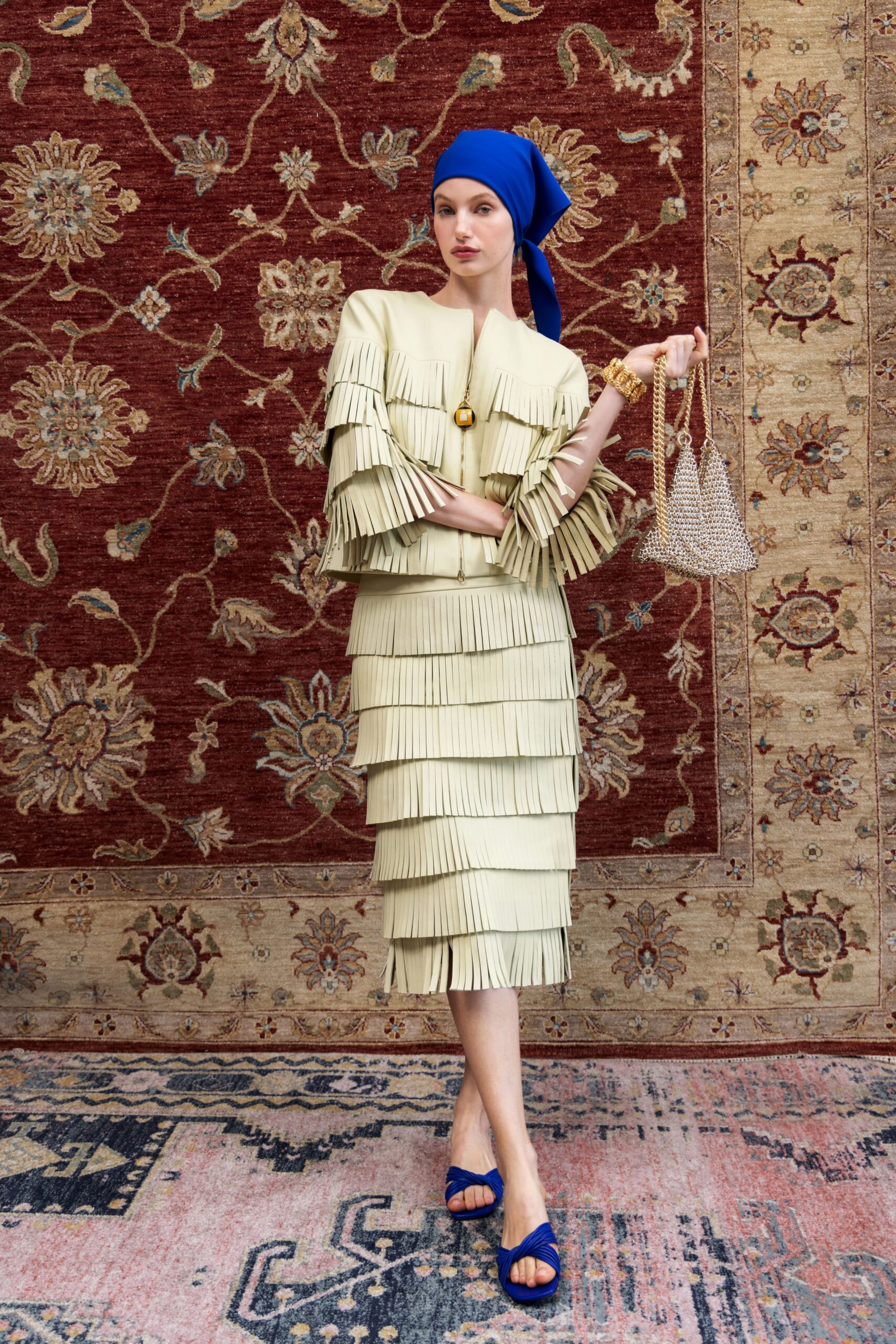 beige fringed midi dress with blue accessories