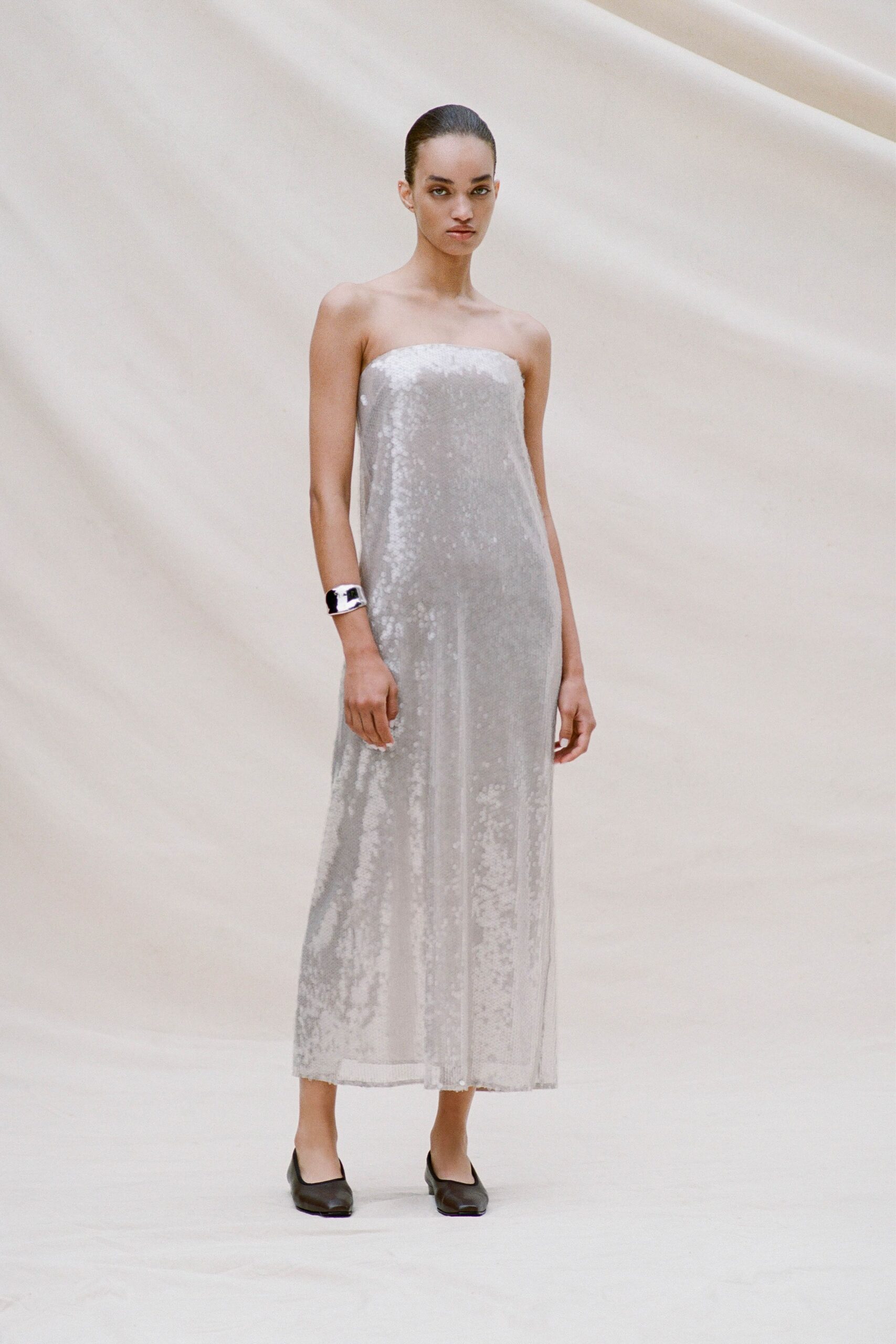 gray sequin strapless fitted shiny maxi gown