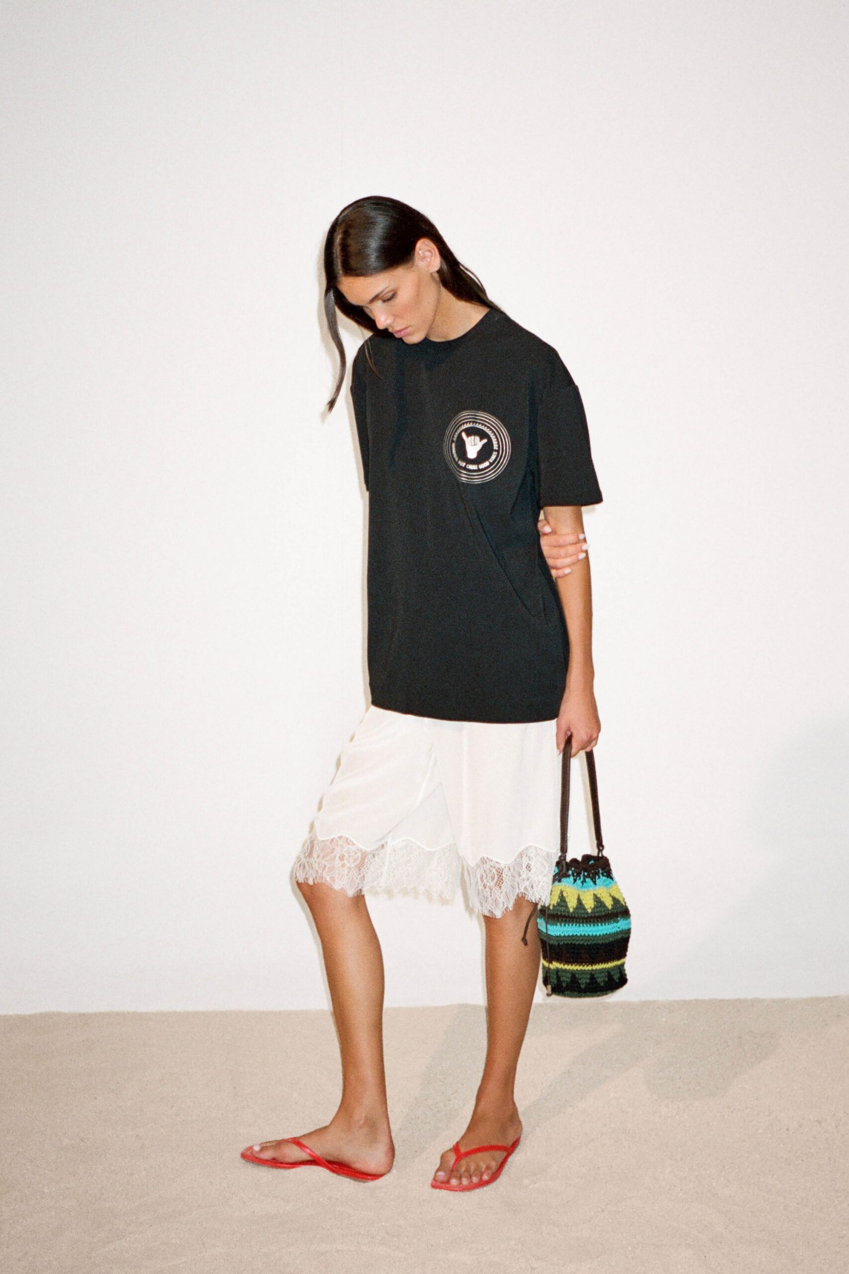 black t-shirt white shorts
