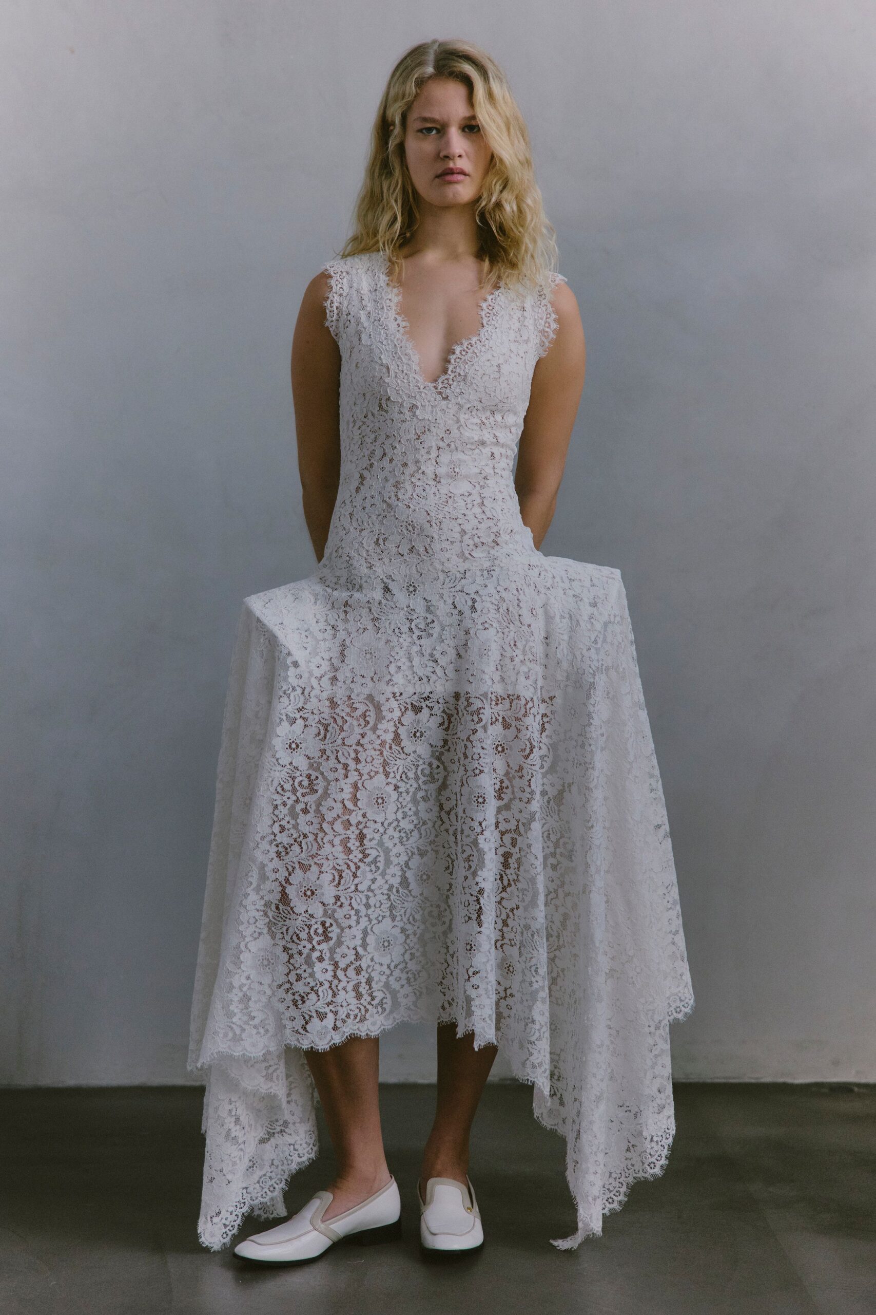 white lace sleeveless v-neck fitted layered pleated dress