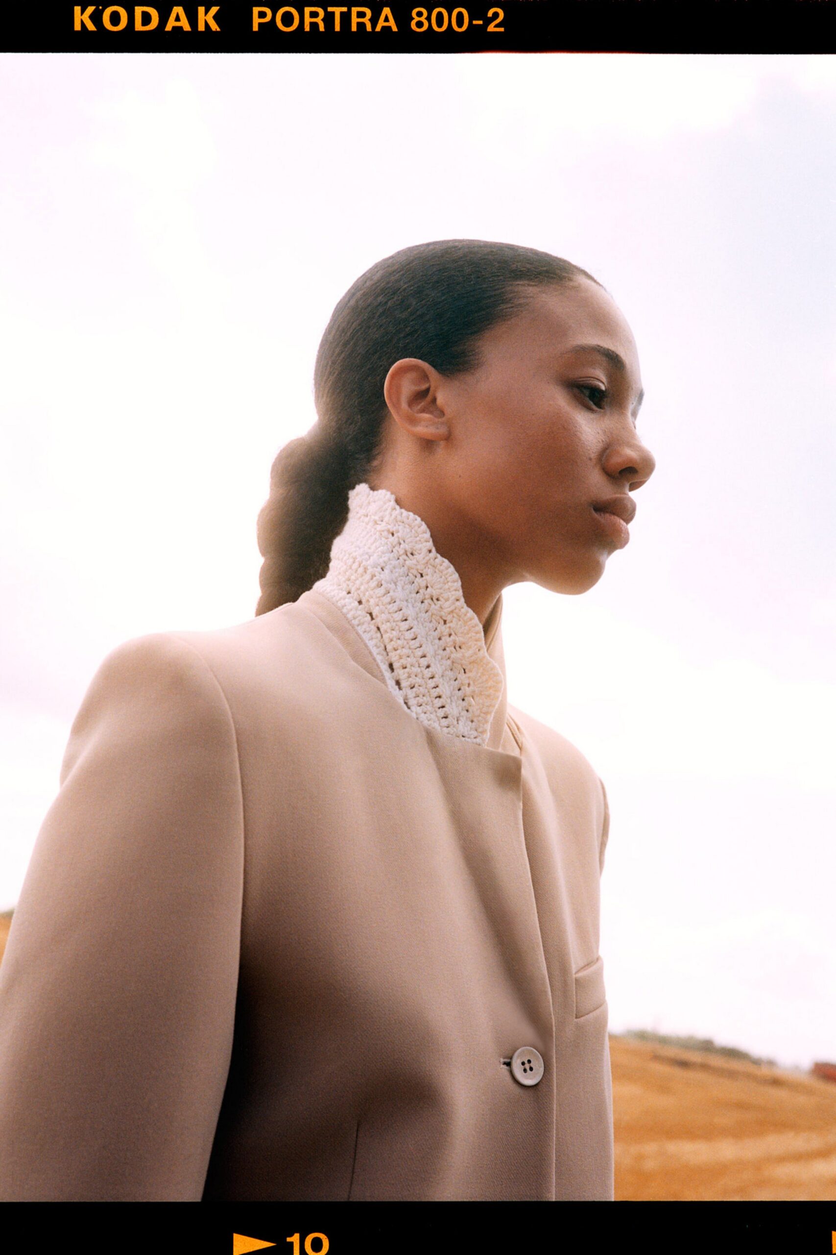 beige blazer with white lace top