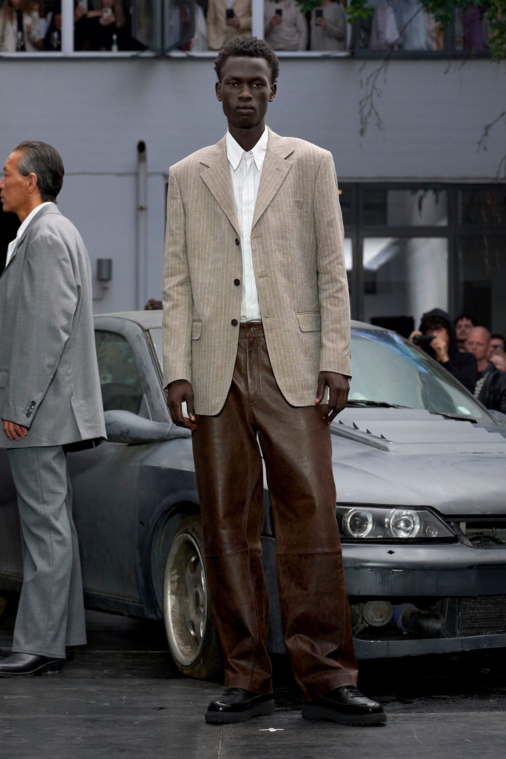 beige striped blazer brown leather pants