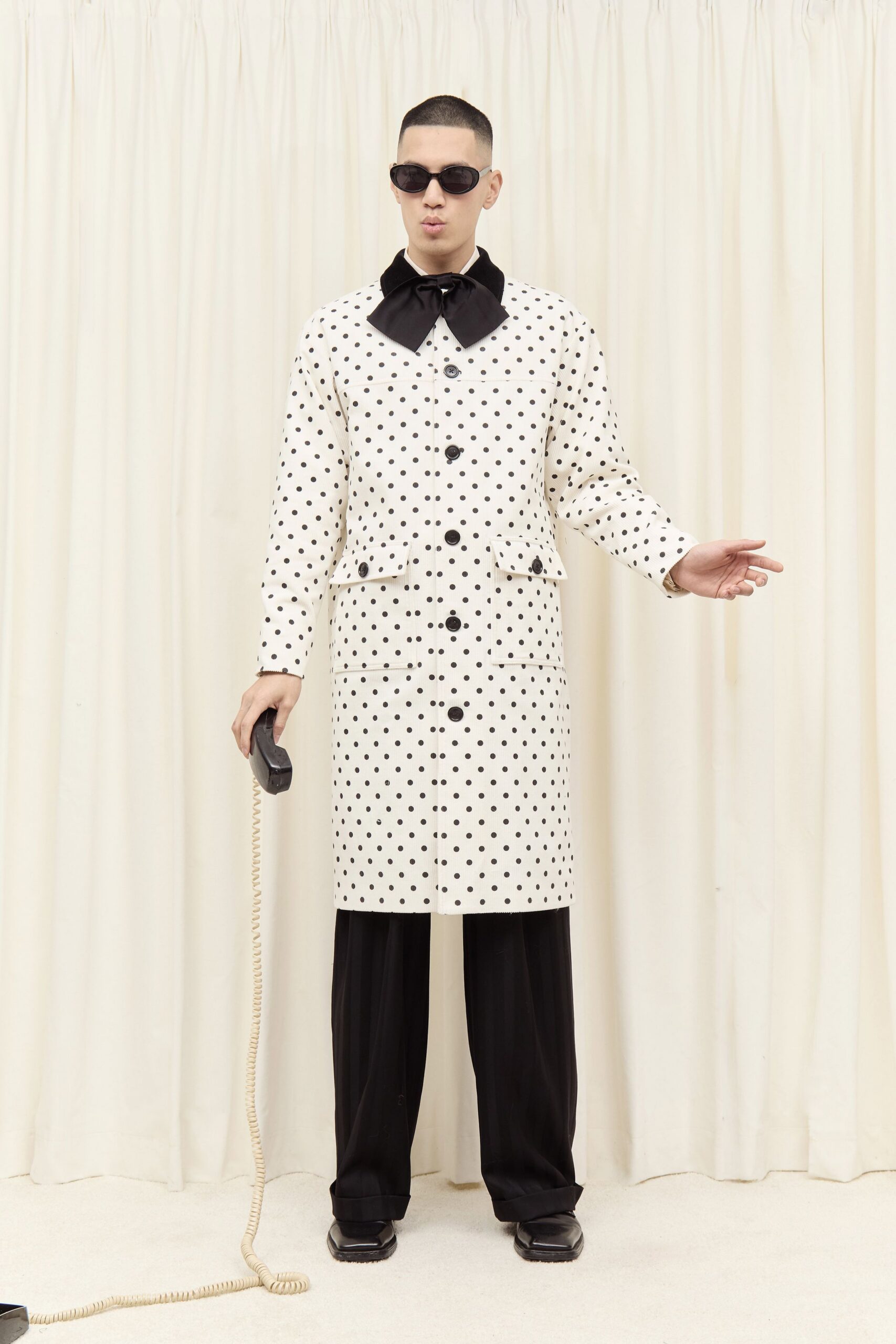 polka-dot coat with black pants