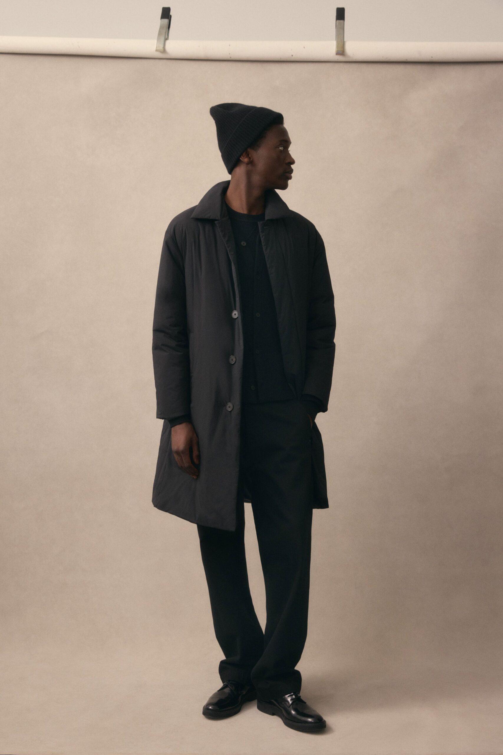 black coat and pants outfit