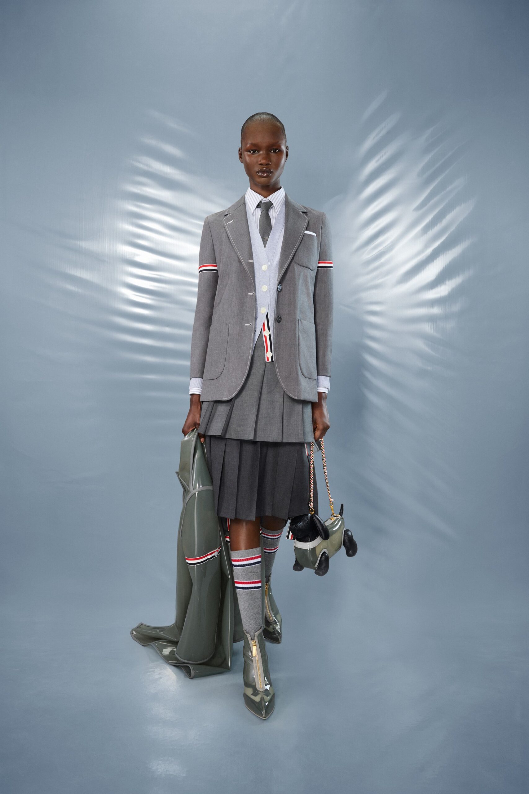 gray tailored blazer with pleated skirt