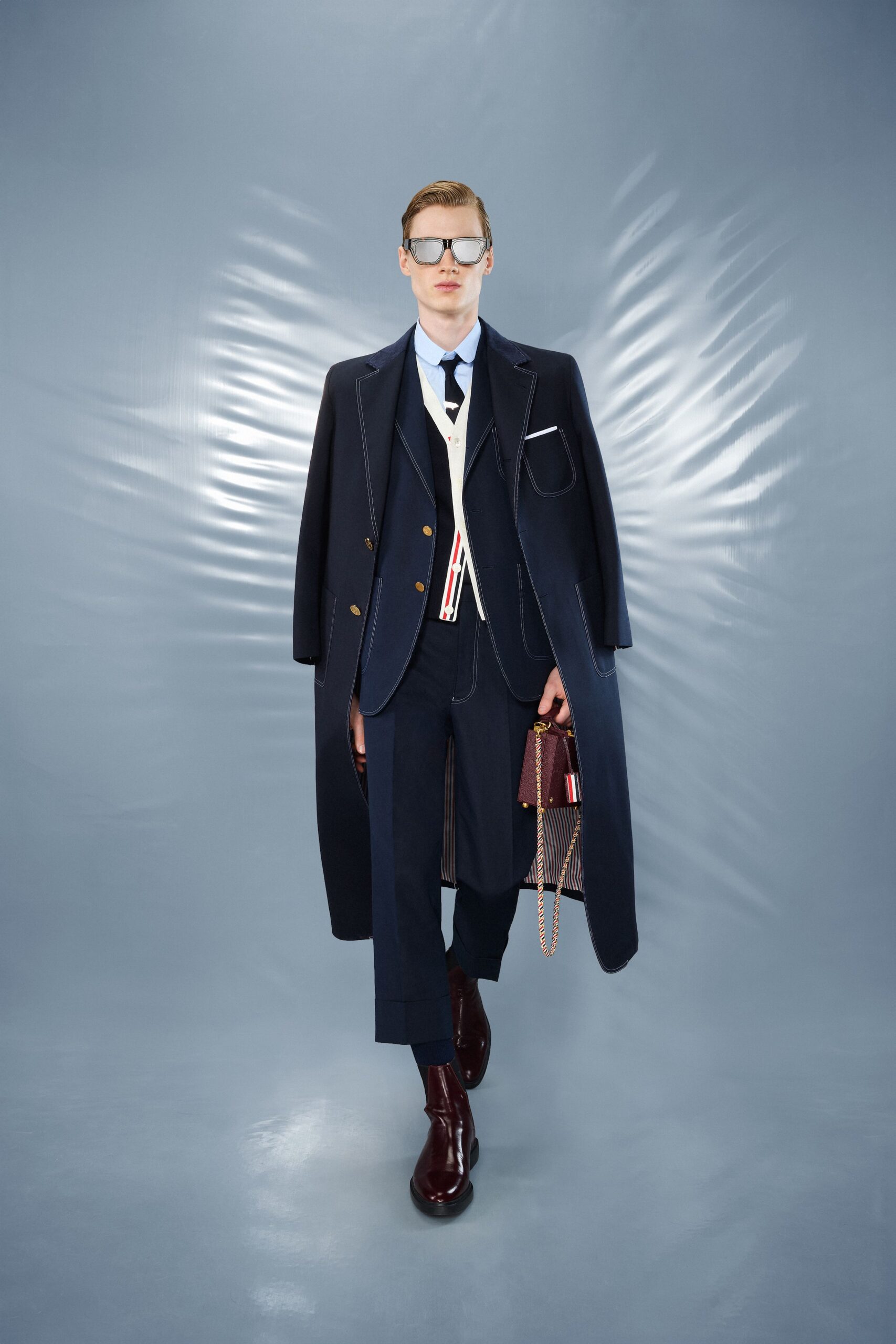 blue wool long-sleeve collared structured buttoned coat